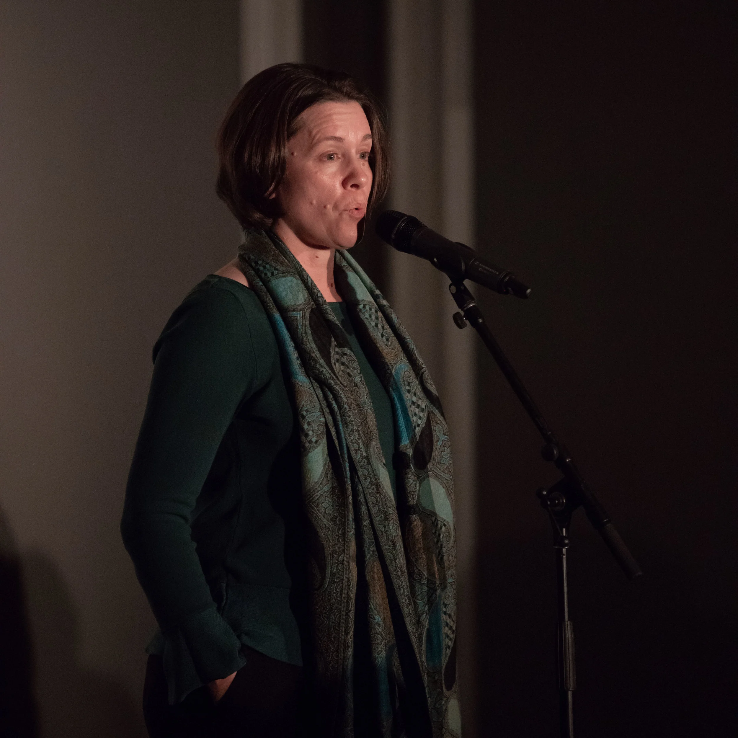 Tracy Dixon-Salazar shares his story with the Story Collider audience at The Little Nell in Aspen, CO in June 2019. Photo by Dale Ramos.