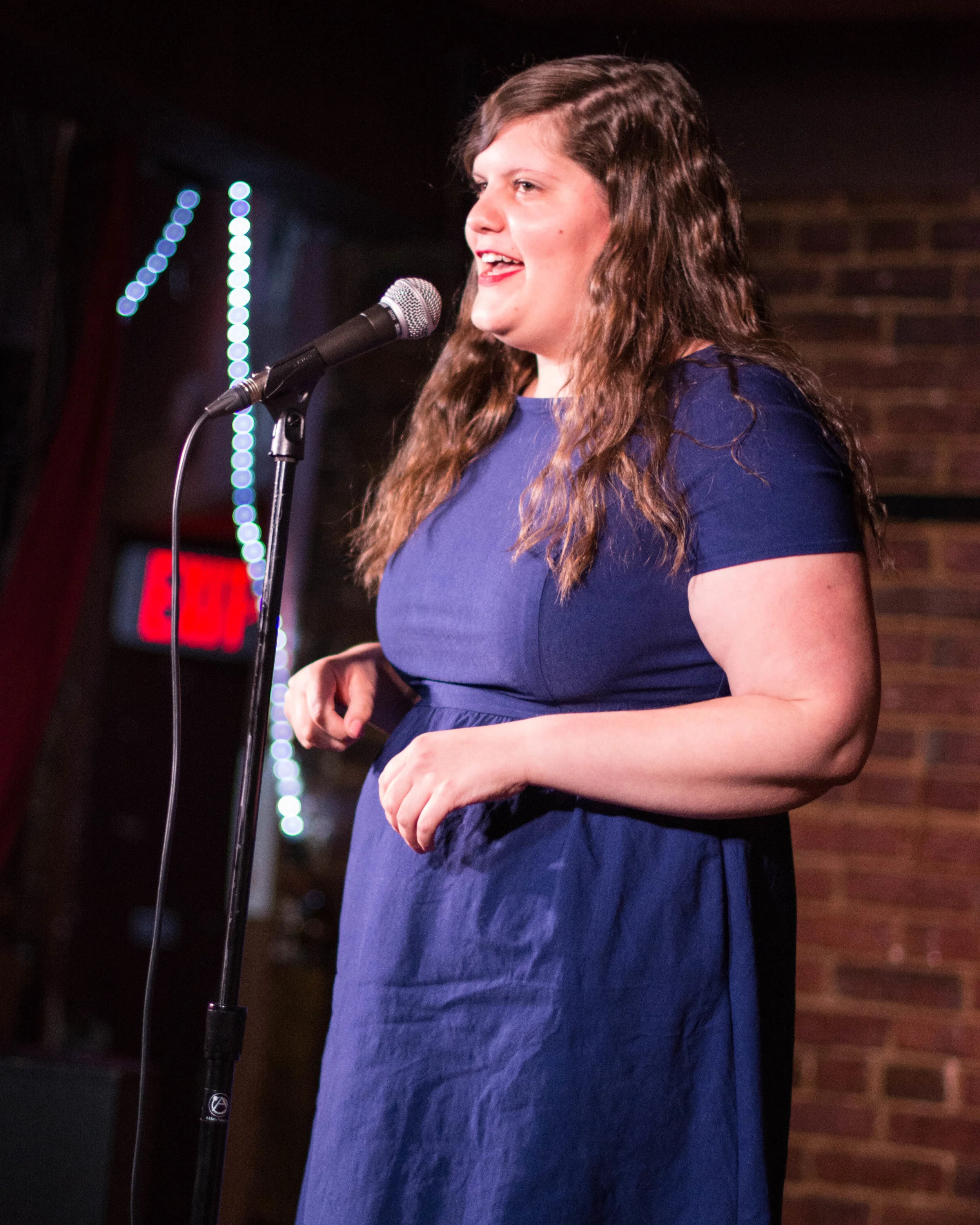 Jenn Montooth shares her story with the Story Collider audience at the Beir Baron Tavern in Washington, DC in June 2019. Photo by Lauren Lipuma.