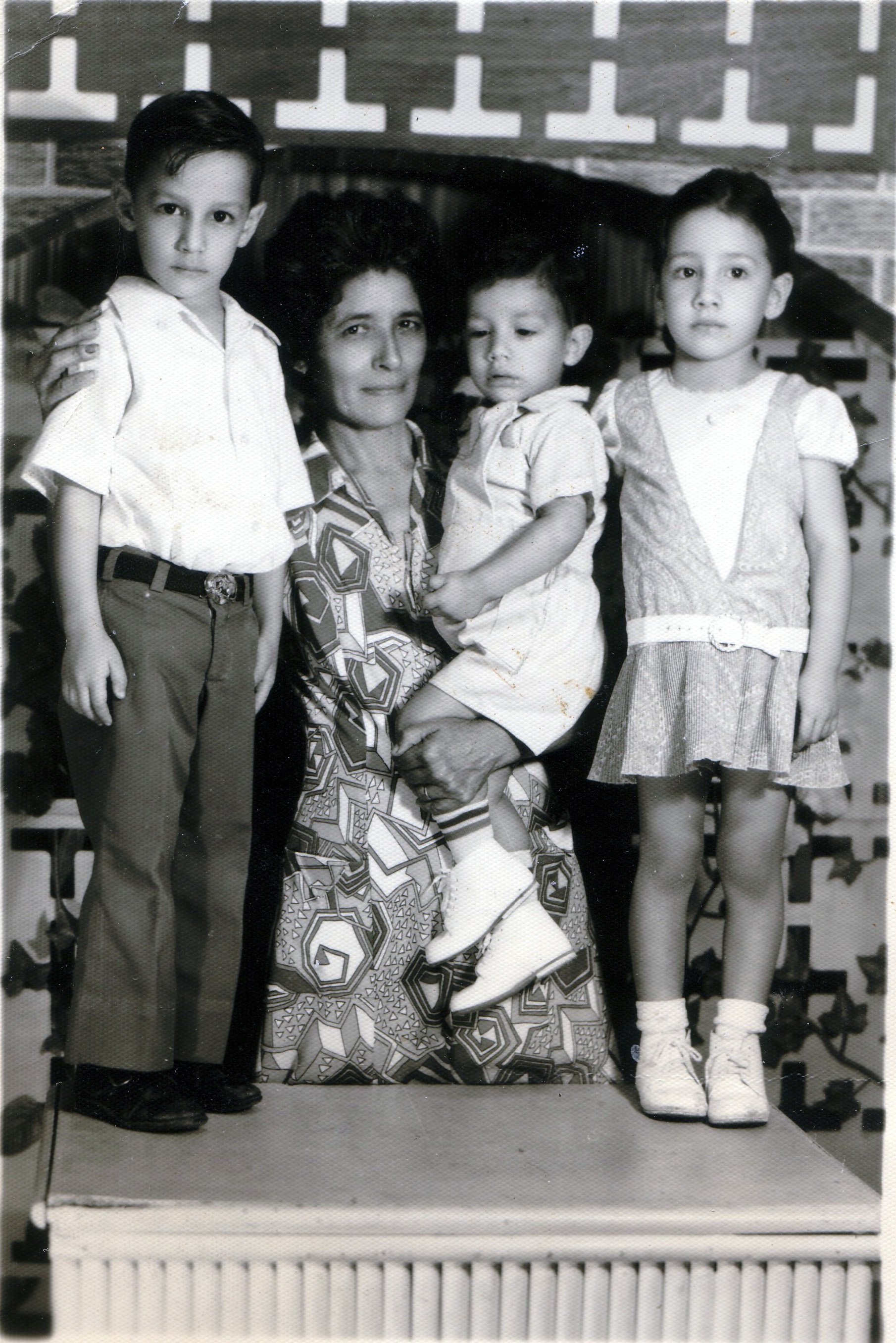  Before César’s journey to the United States. César Nufio, Edith Arriaza (grandmother), Eddie Nufio, and Mayrim Nufio (Tirado). Photo courtesy of César Nufio. 