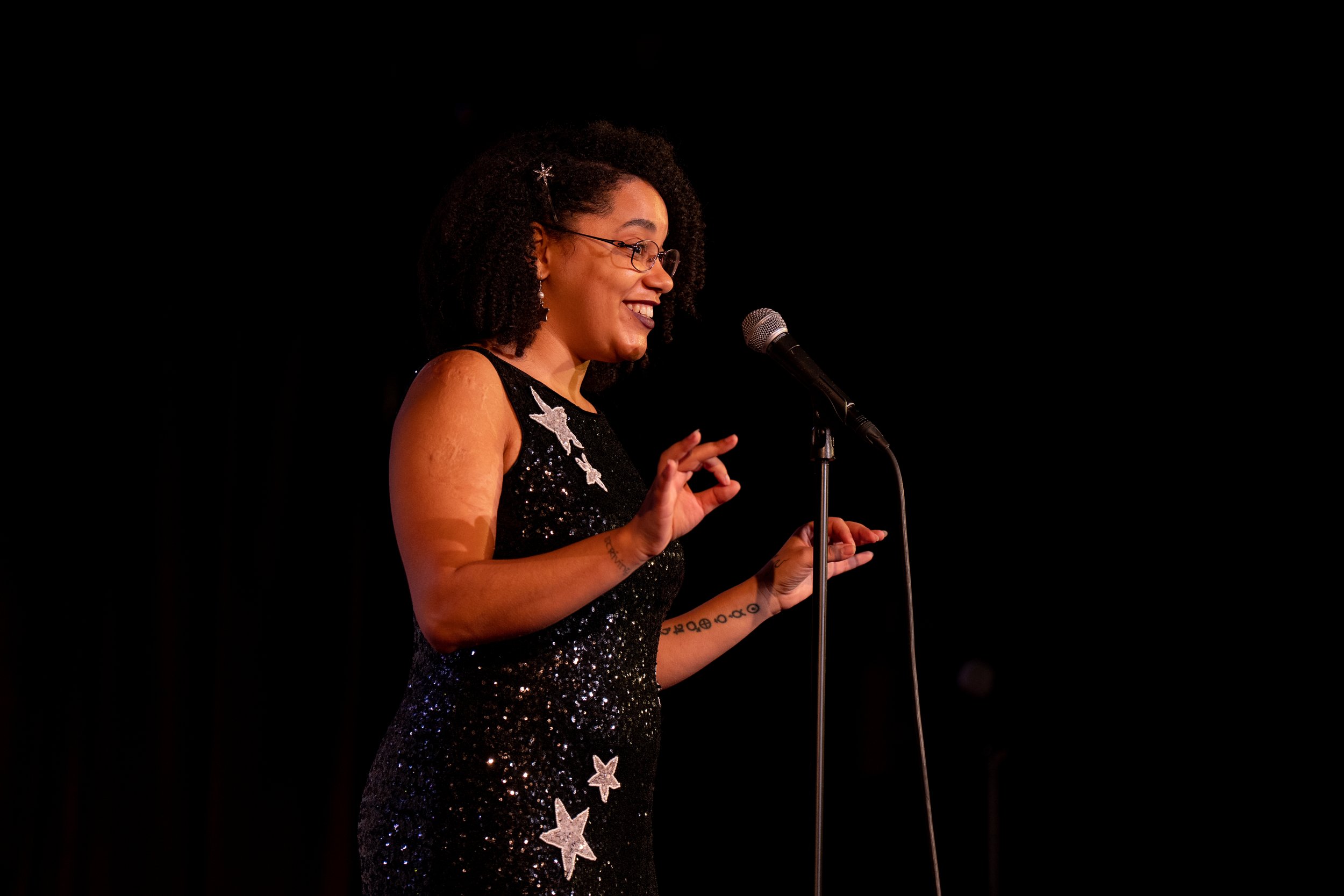  Astrophysicist, folklorist, and science communicator Dr. Moiya McTier shares her story on stage at The Bell House in Brooklyn, NY. 