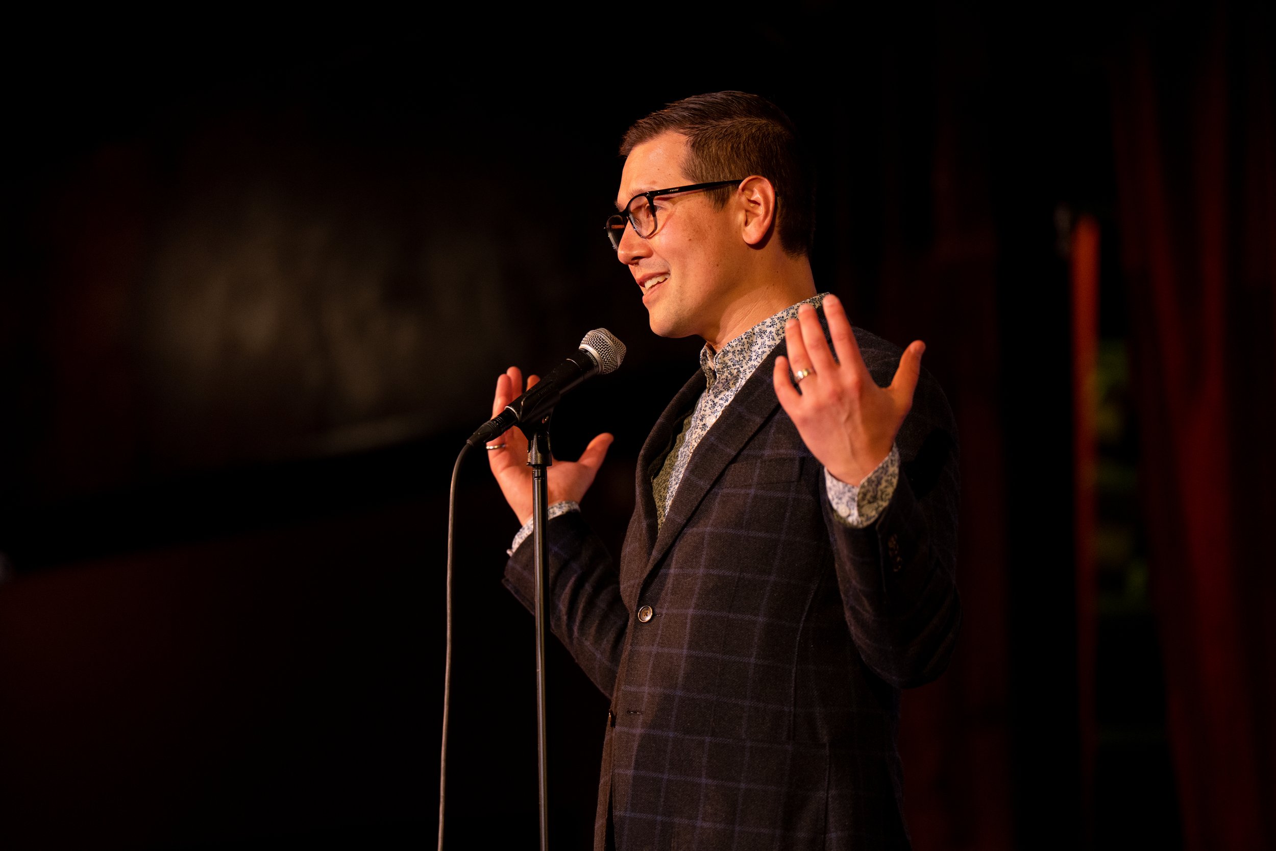  Story Collider board President Eric Jankowski on stage at The Bell House in Brooklyn, NY. 