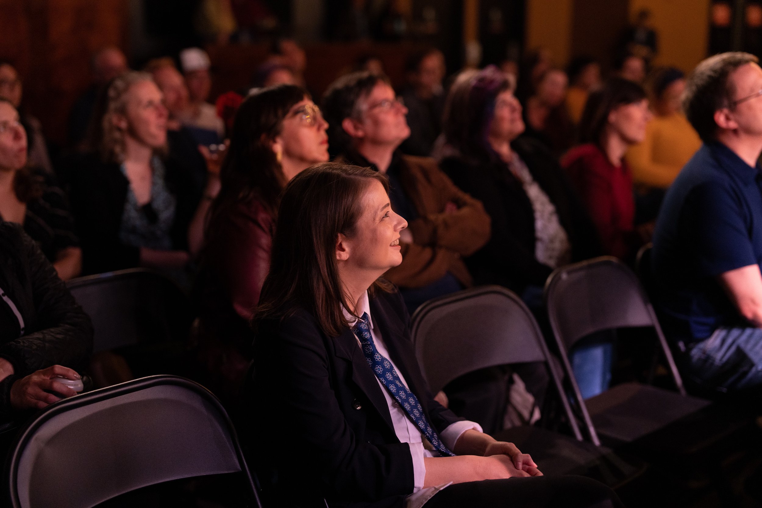  Executive Director Erin Barker watches the show from the audience.  