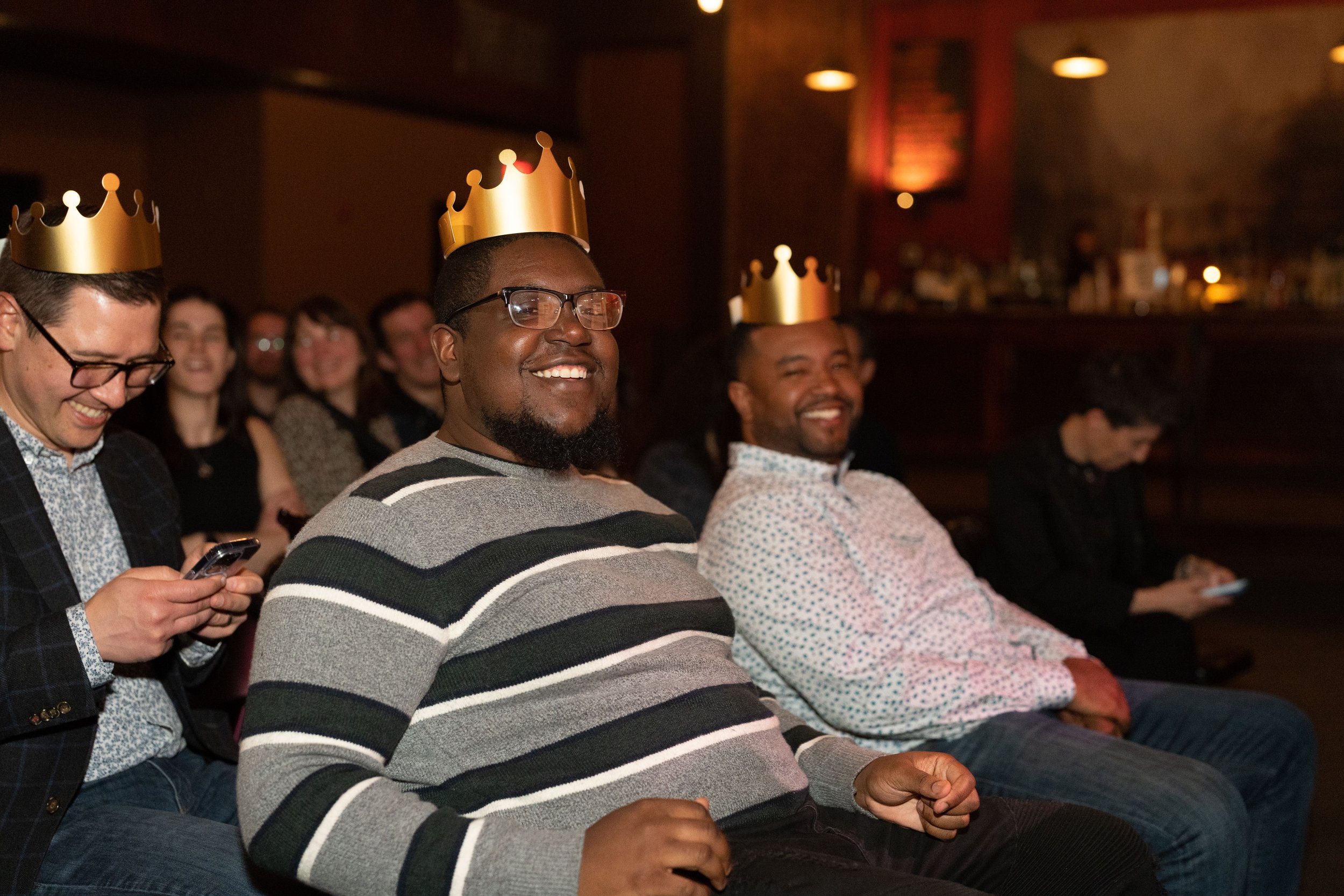  Story Collider producer Juan Carlos (left) and guest in the audience. 