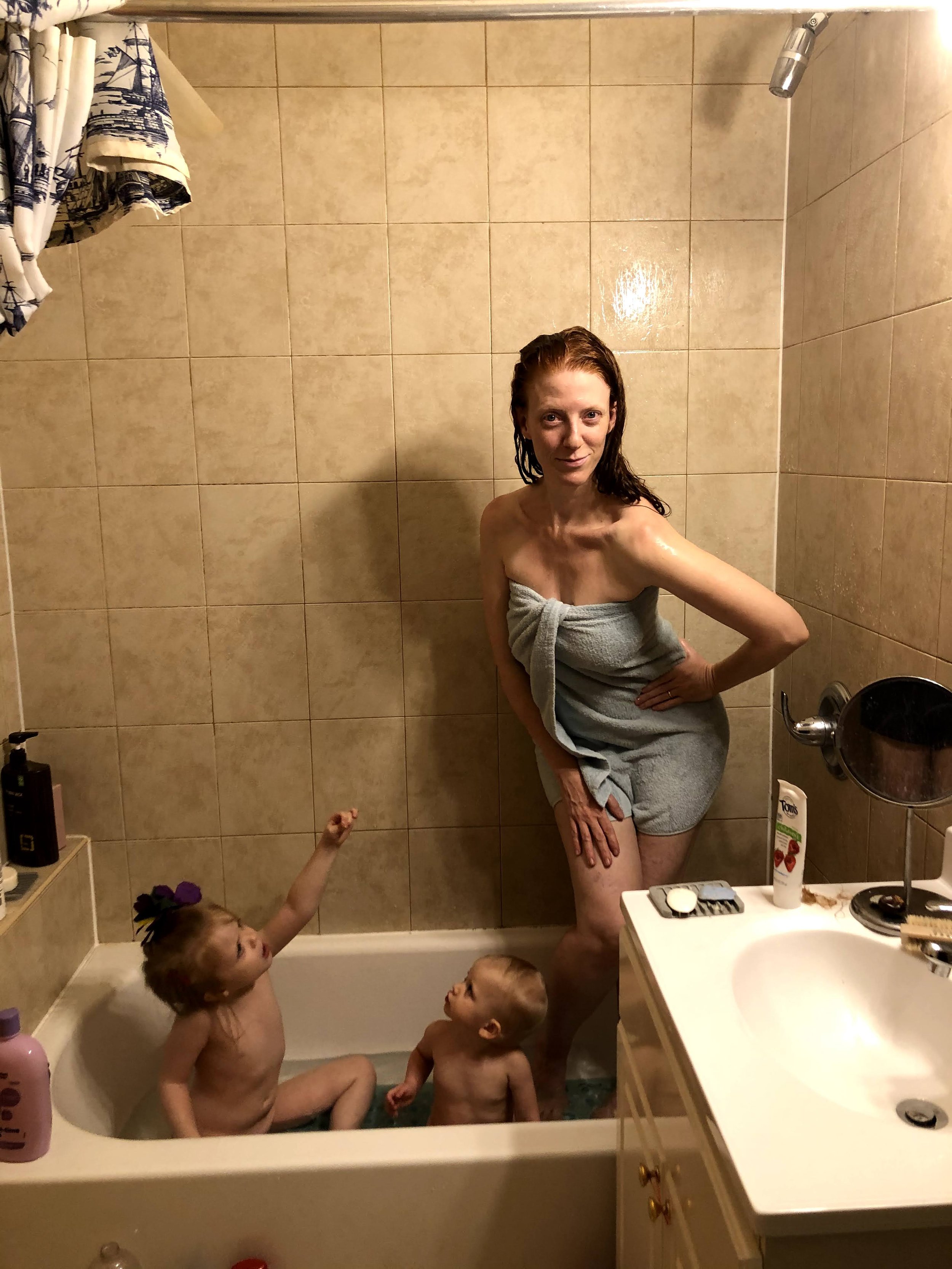  Julia Whitehouse in the infamous bathtub with her two children. Photo courtesy of Julia Whitehouse.  
