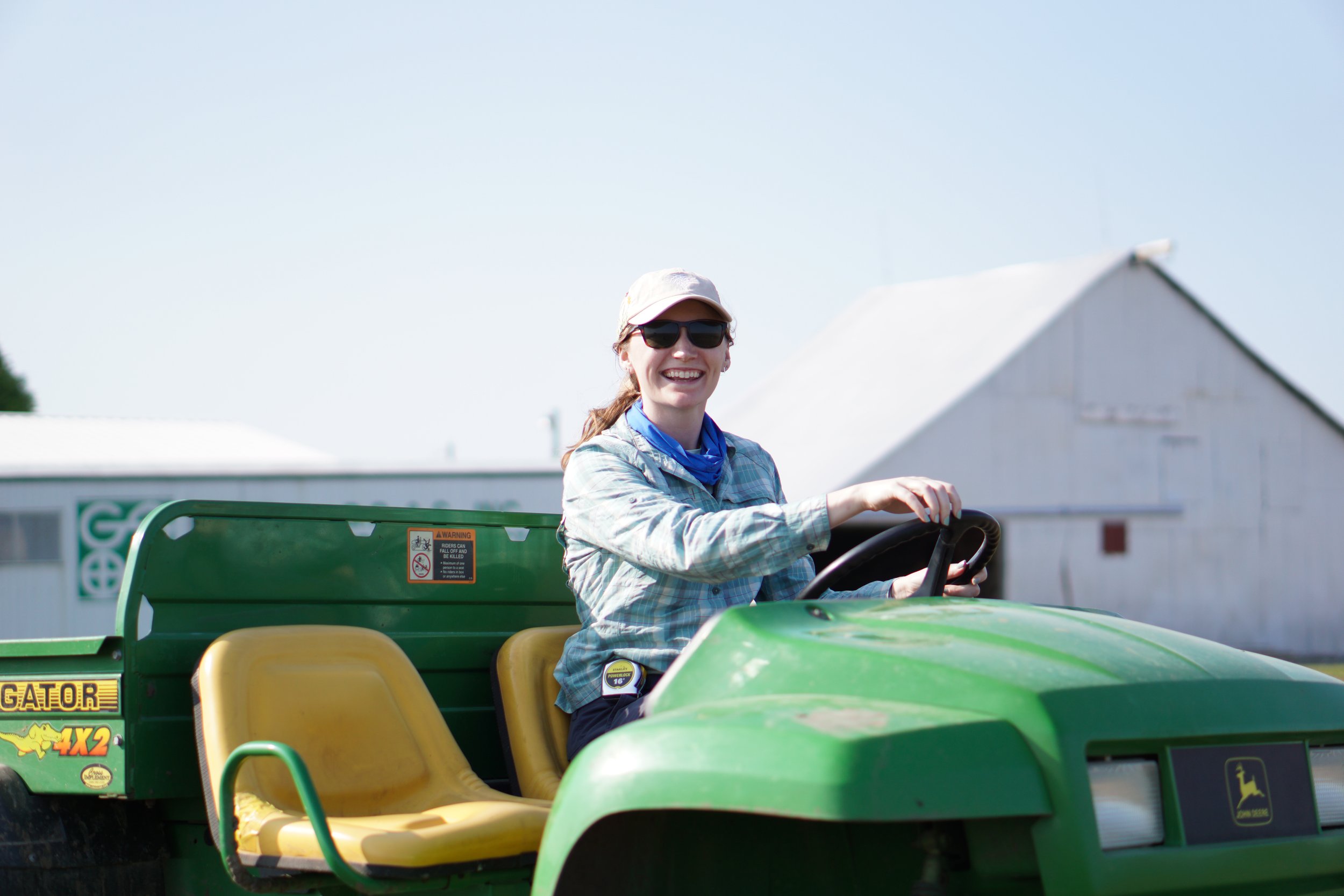  Dr. Murphy drives a “gator” at the Donald Danforth Plant Science Center Field Research Site, where she researches how corn grows under different conditions. Photo credit: Donald Danforth Plant Science Center 