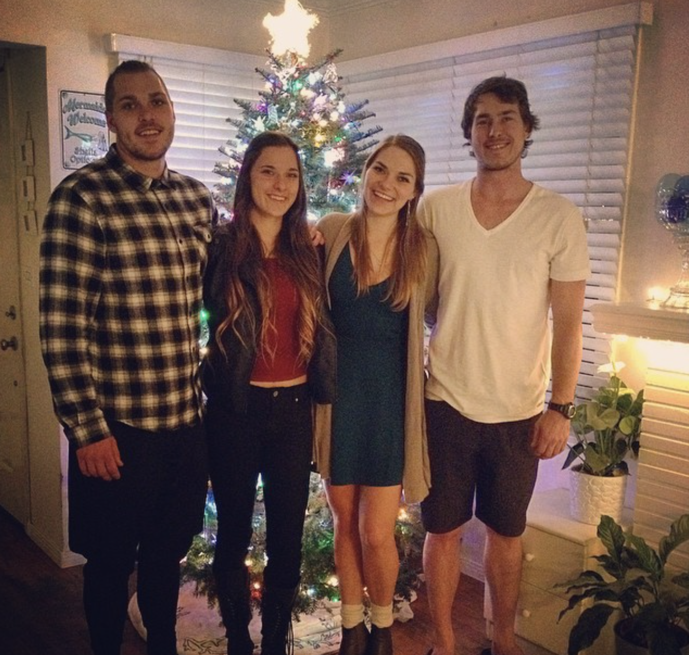  Nina with her siblings at Christmas. Photo courtesy of Nina Christie. 