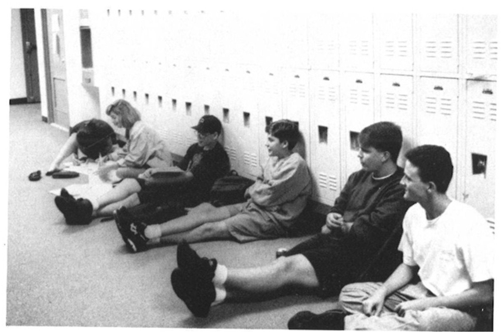  Students hanging out in the hallways. 