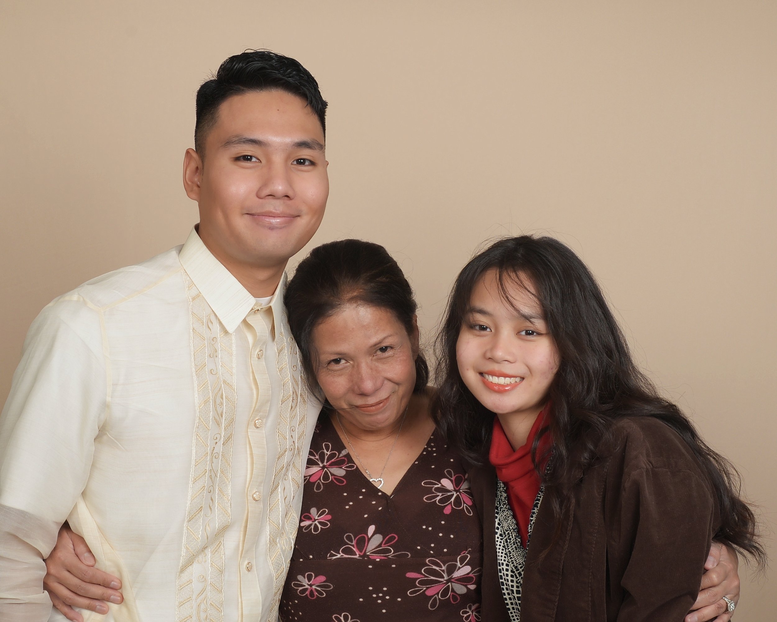 Myself, my mom, and my younger sister.jpg