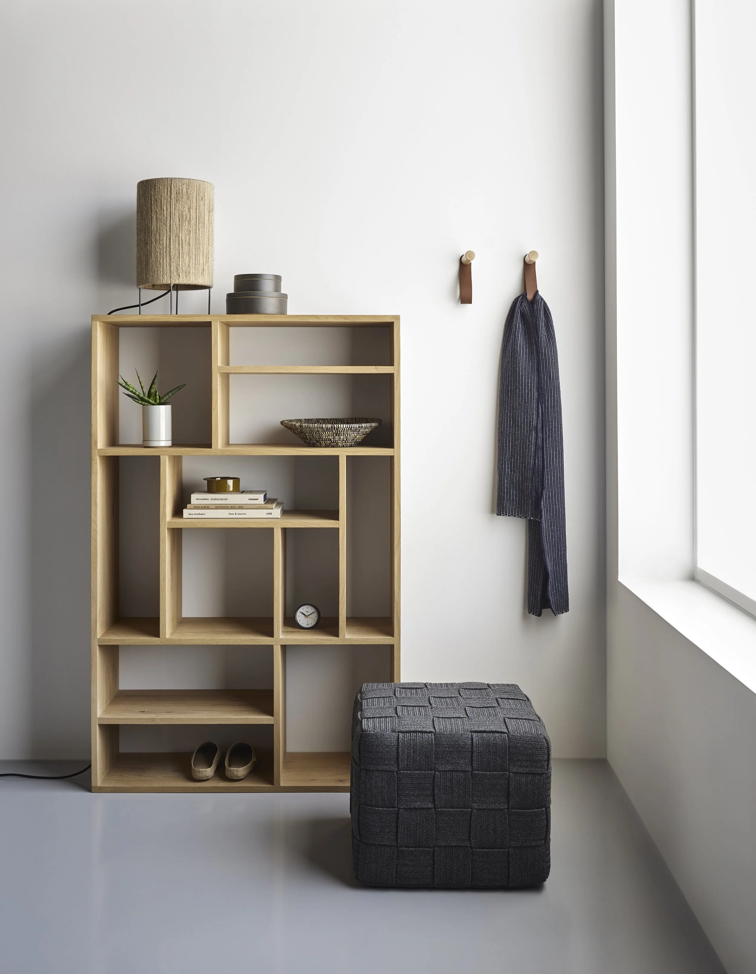 M shelving, cube dark gray ottoman_pg 28 copy.jpg