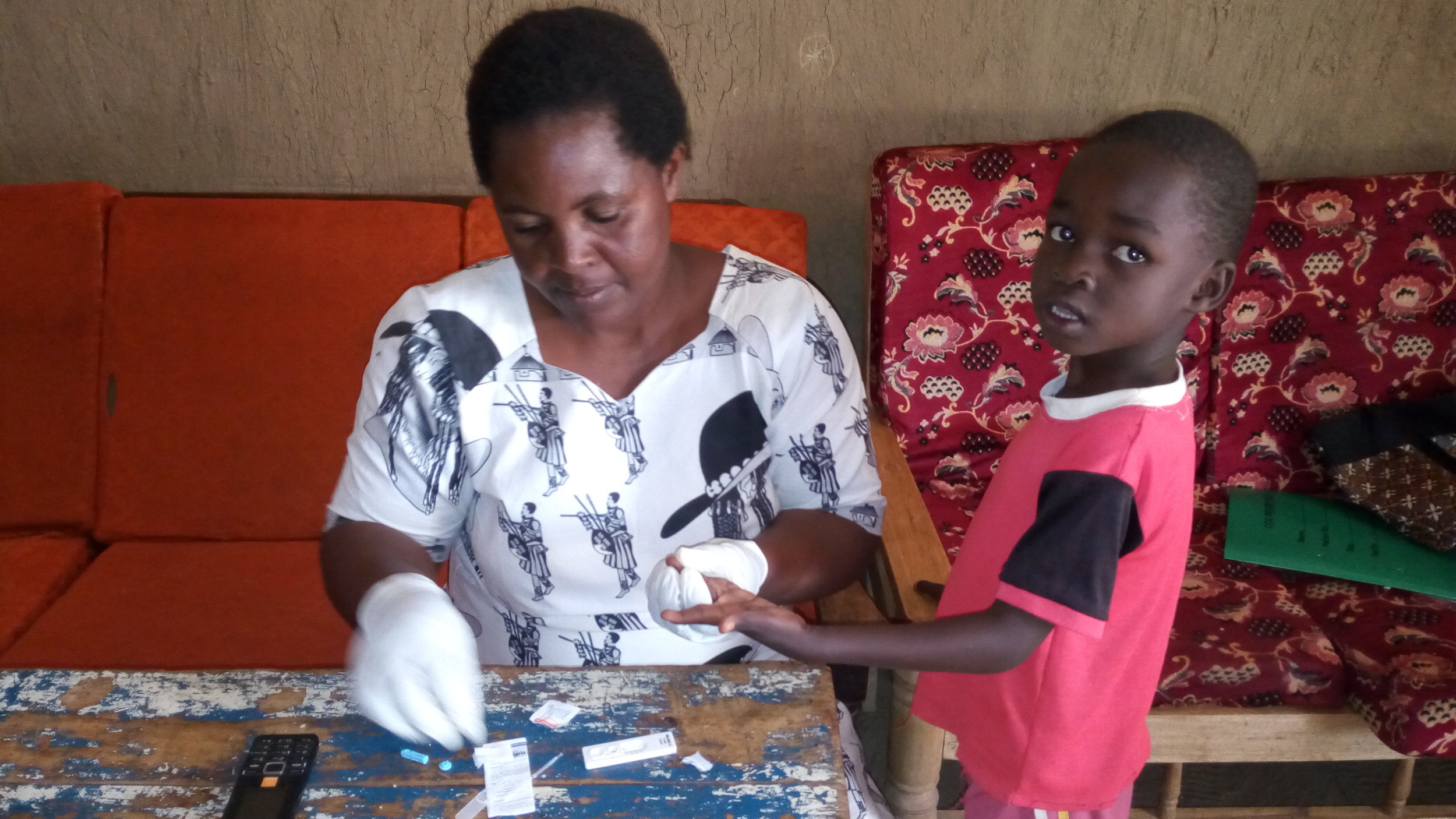 Testing for malaria in the home.