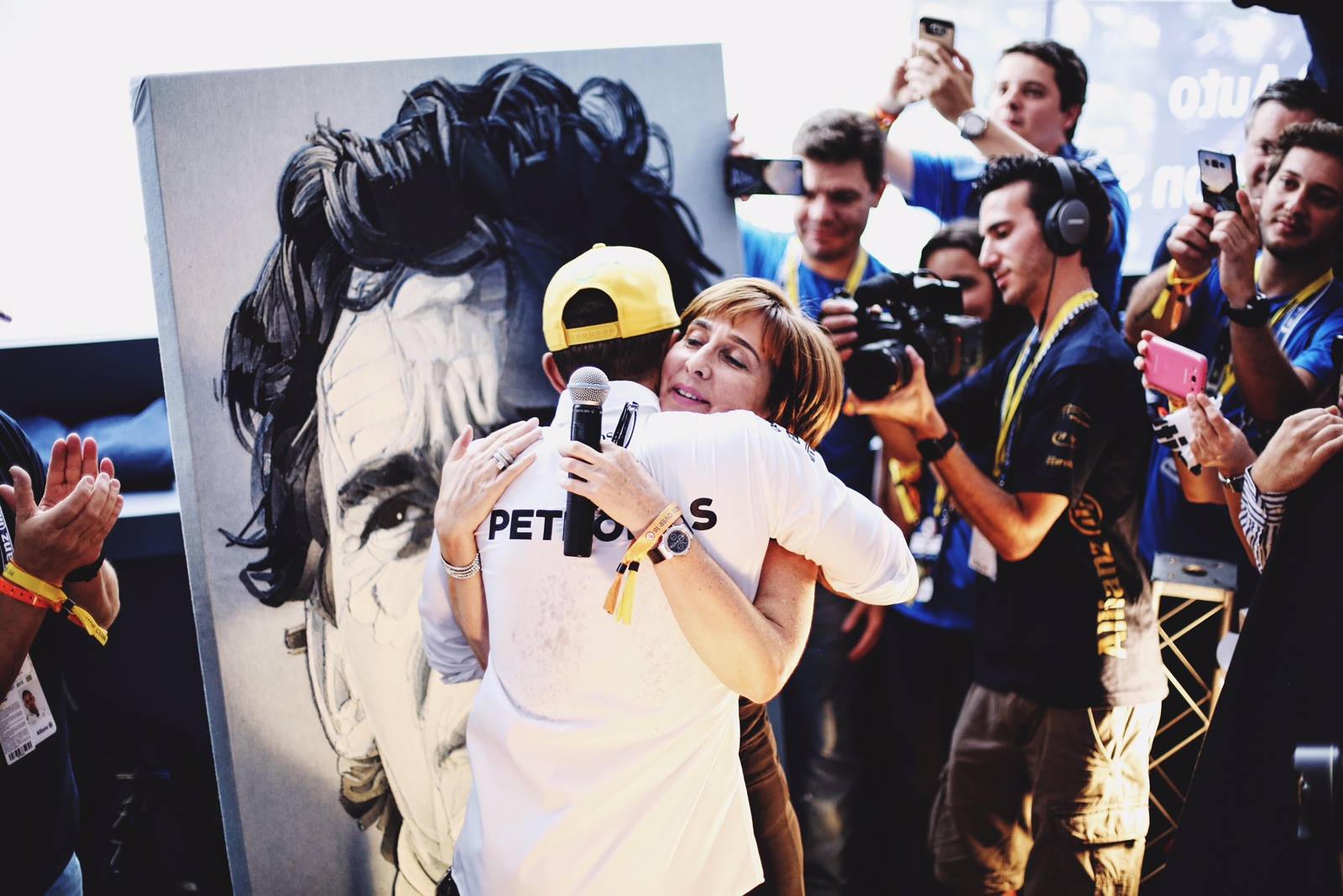 All through his career Lewis Hamilton has spoken fondly and passionately about Ayrton Senna, and has always been linked with the Brazilian. Lewis grew up wanting to emulate Ayrton when he was watching him as a young boy and this year his childhood dream came true by matching his thrice World Champion title. As someone who has kept Ayrton constantly talked about and keeping his name alive the Senna family wanted to give Lewis a personal gift to mark his achievement. 'Having seen how Lewis talks about Ayrton it is a great honour for me to know that to mark his achievement the family chose to present him with a piece of my work. It is a beautiful story, every time I see Lewis talk he talks about Ayrton, and especially this year. He has spent his life wanting to emulate him and now he has. To get that 'you made it, well done' from Ayrton's sister Viviane and family to represent his hero was a special moment and it is great that this symbolic moment of the realisation of the dream they chose the work I made. And to get Lewis's reaction was even more special.' Lewis was presented Number 3 of 11 special Edition to the same scale as the original piece, specially printed onto denim with stitched edges, a leather patch personalised for him as well as personal messages lasered into the denim.