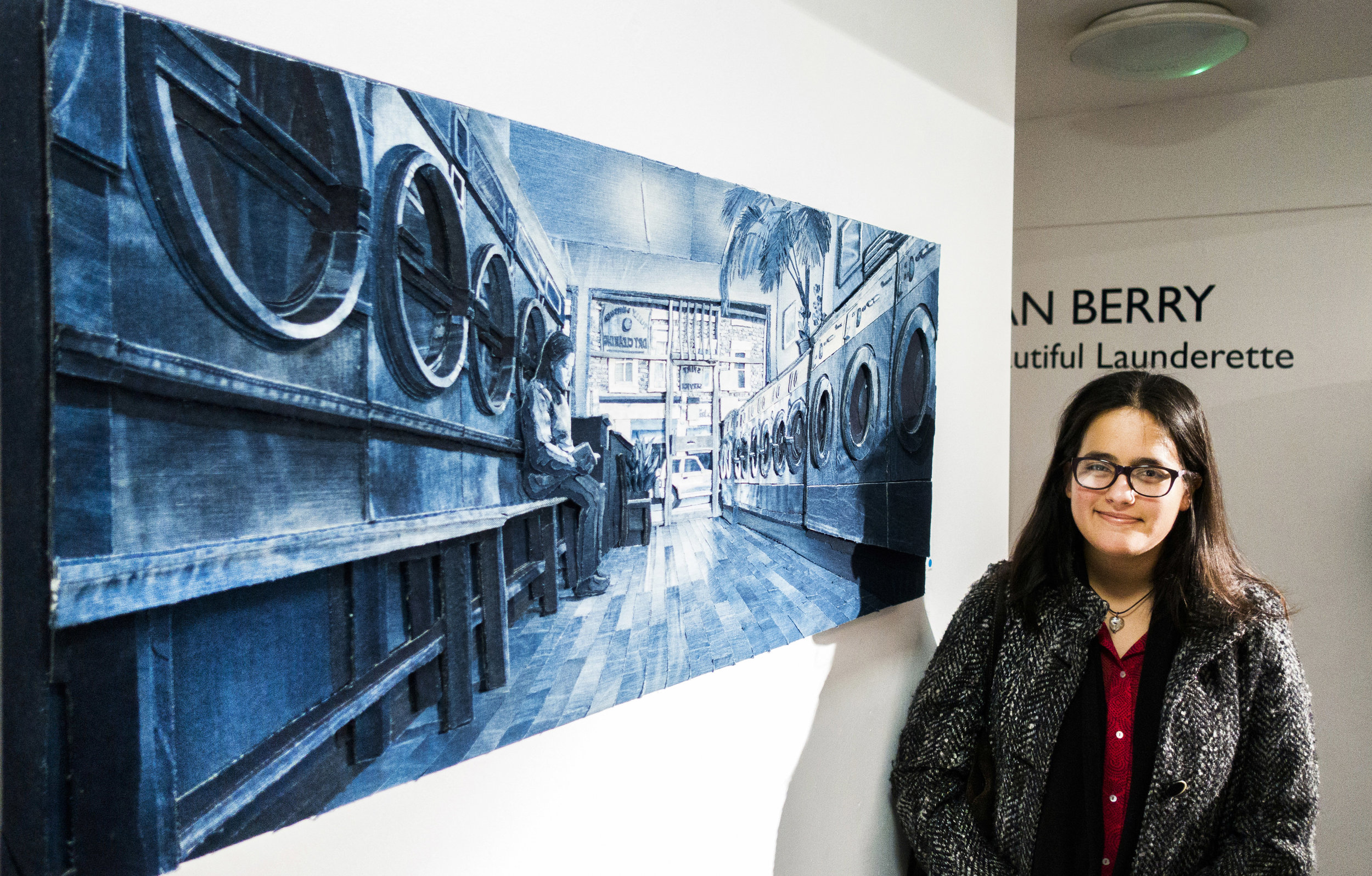 Alexandra Aparicio with the piece that she modeled for
