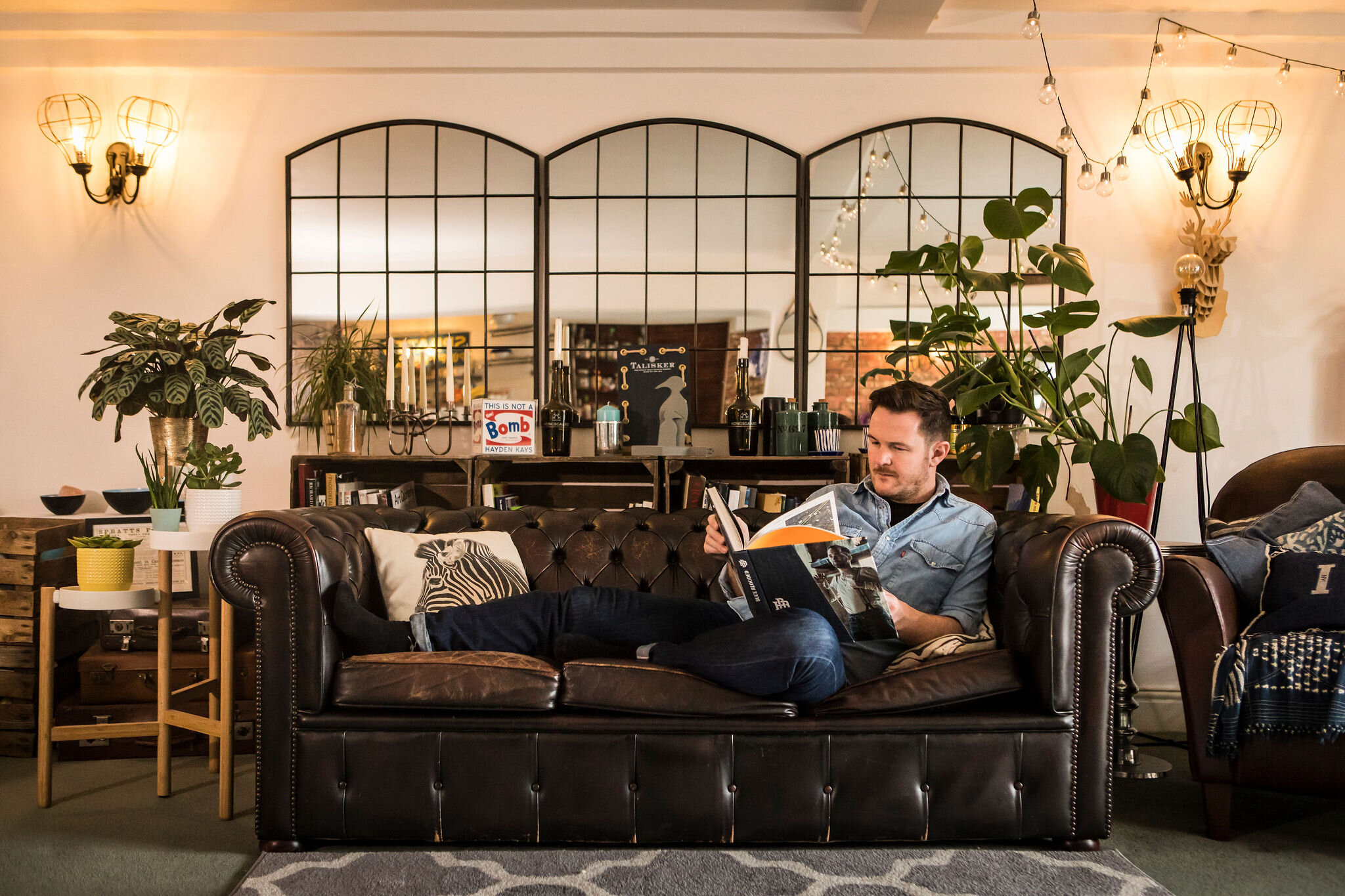 Ian in his factory conversion in the Olds Spratt's Factory in East London in the living space above the studio. 