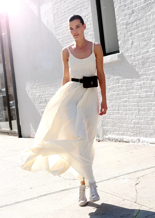 Got a girl crush on: HANNELI MUSTAPARTA
Because seriously, who else can pull of a maxi dress, a fanny pack, AND Converse hi-tops in one outfit?!