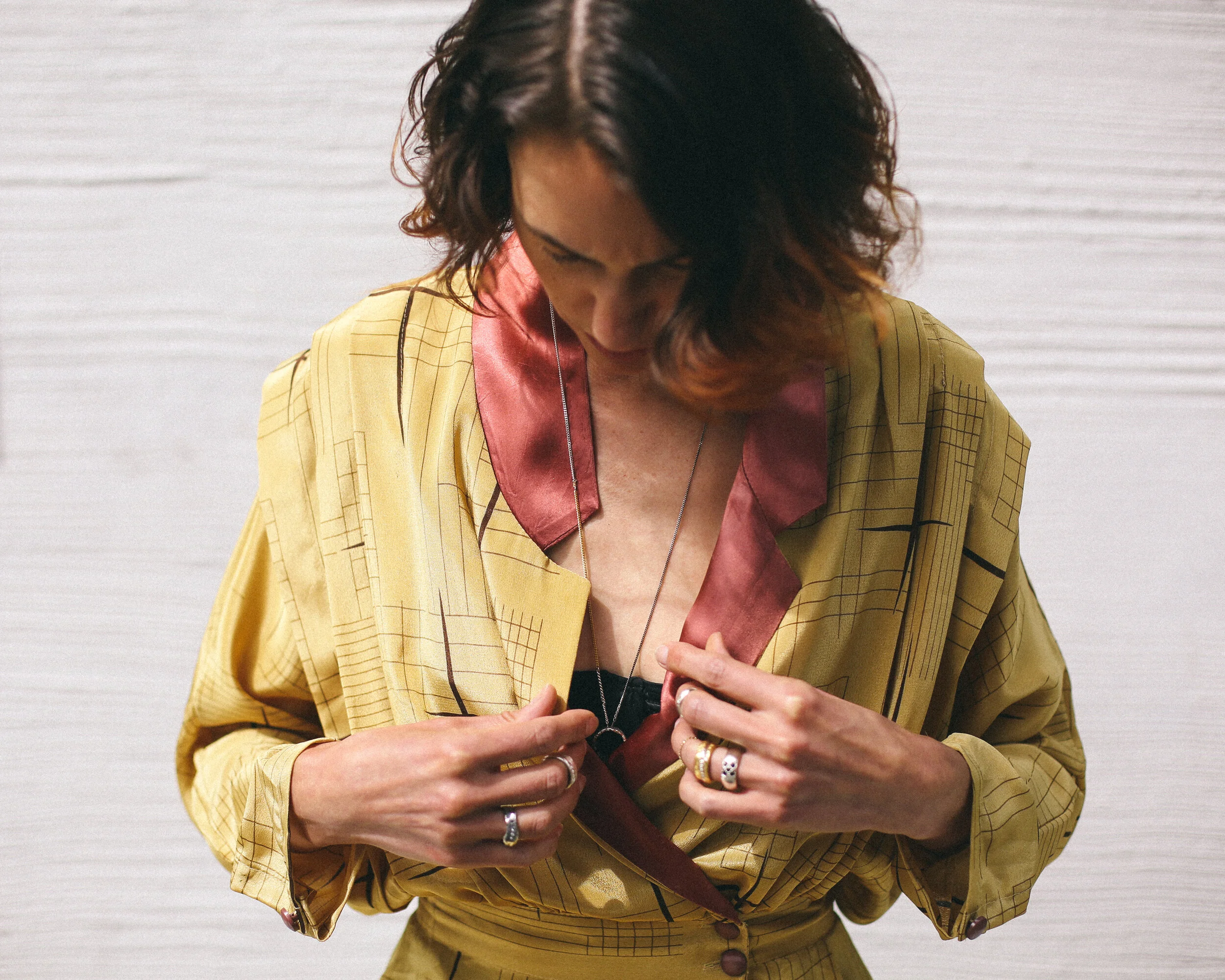 Gina Melosi wearing SILVER LINING Ring #1 from GINA MELOSI's mini collection "no hay mal que por bien no venga"