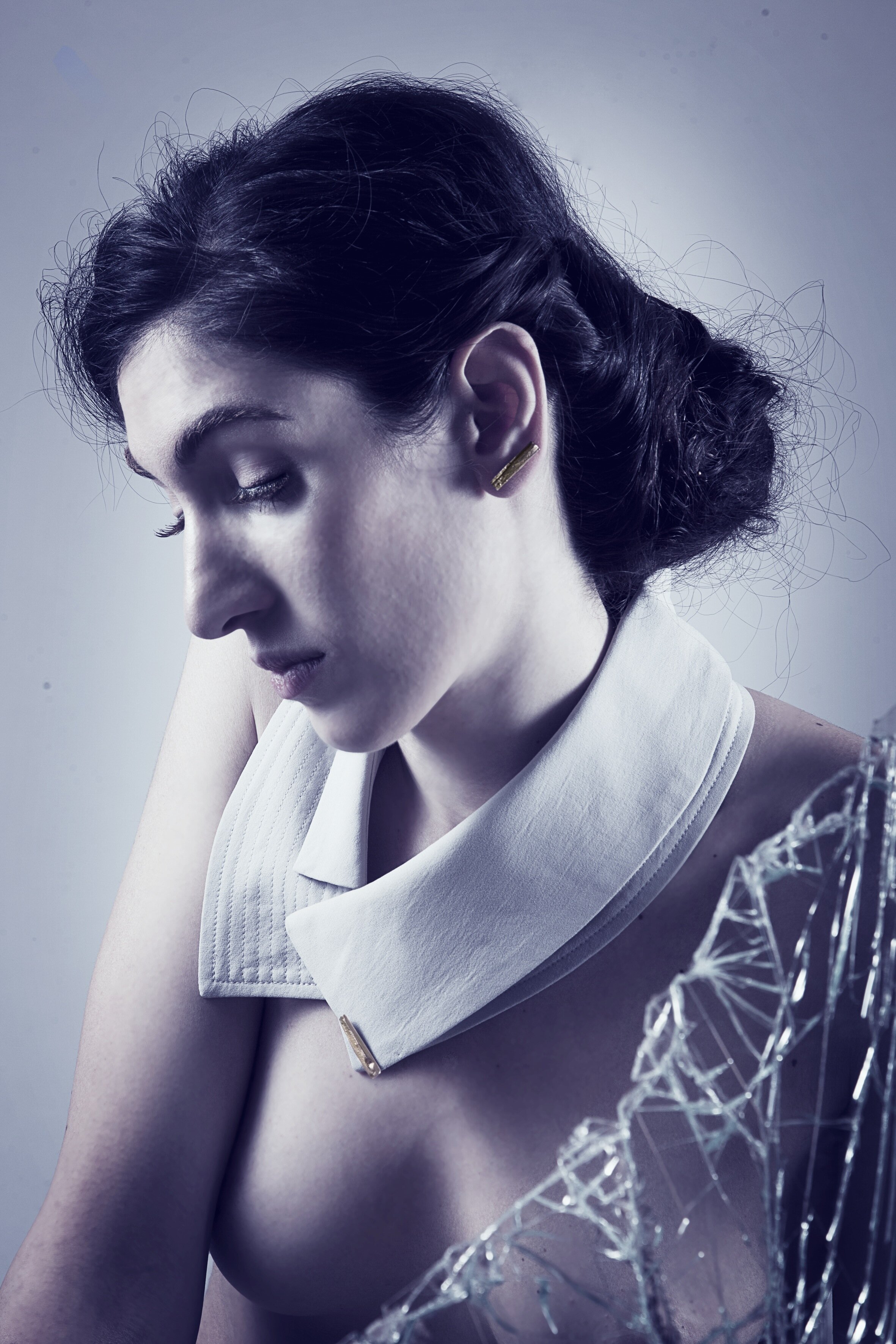 Alessandra Bisi wearing Pin Brooch handmade in yellow gold plated recycled bronze from GINA MELOSI's //CRACKED// collection