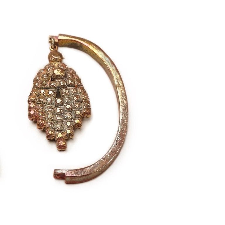 ORPHAN GIRL Earcuff (Left) in rainbow copper from GINA MELOSI's LASTCHANCE/LOSTCHILD collection