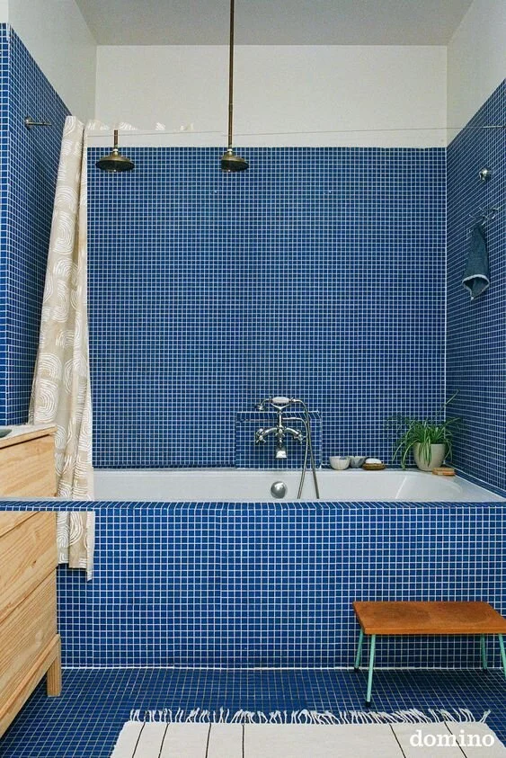 Blue square bathroom tile, photo via Domino