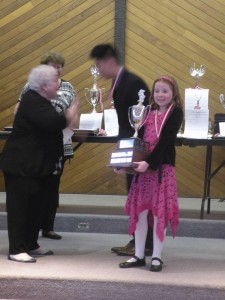 Allison receiving her Trophy at CDMF 