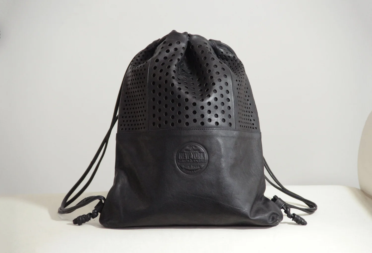  Black Leather Delicate Drawstring Slouch Backpack Leather Drawstring Laser Perforated Black NYC Backpack  main image 3