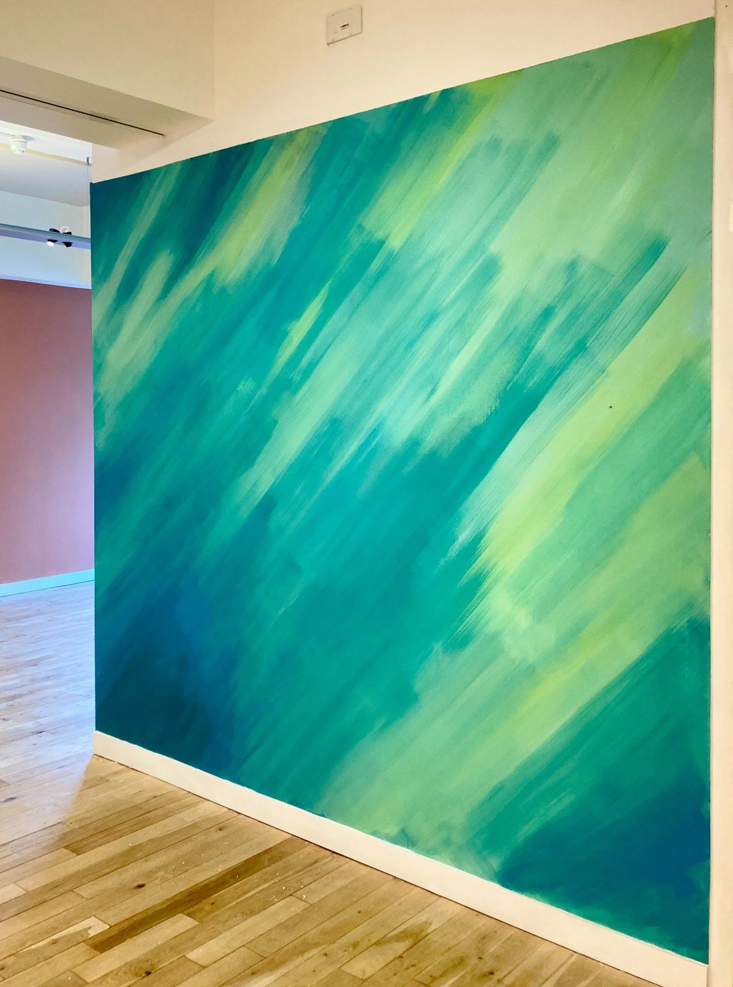 This week I had the fun job of painting the @pageparkarchitects offices. I usually work on A3 paper with watercolour, so painting whole walls with emulsion and huge brushes was a learning curve! It was a lot of fun.
The murals are inspired by the ce