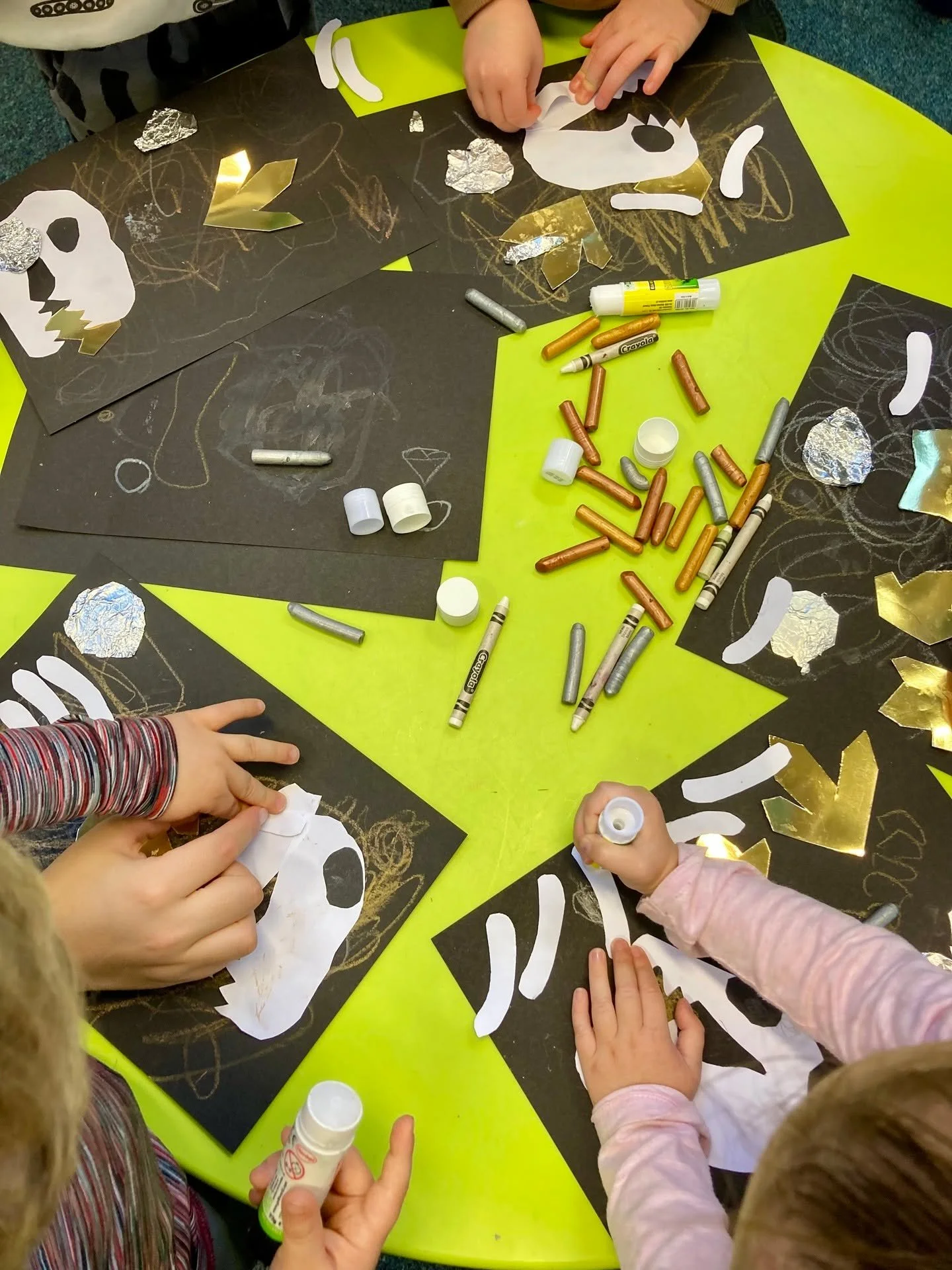 Making underground treasures - a happy frenzy of glue, bones and shiny jewels this morning at the Tales for Tots festival in West Dunbartonshire.