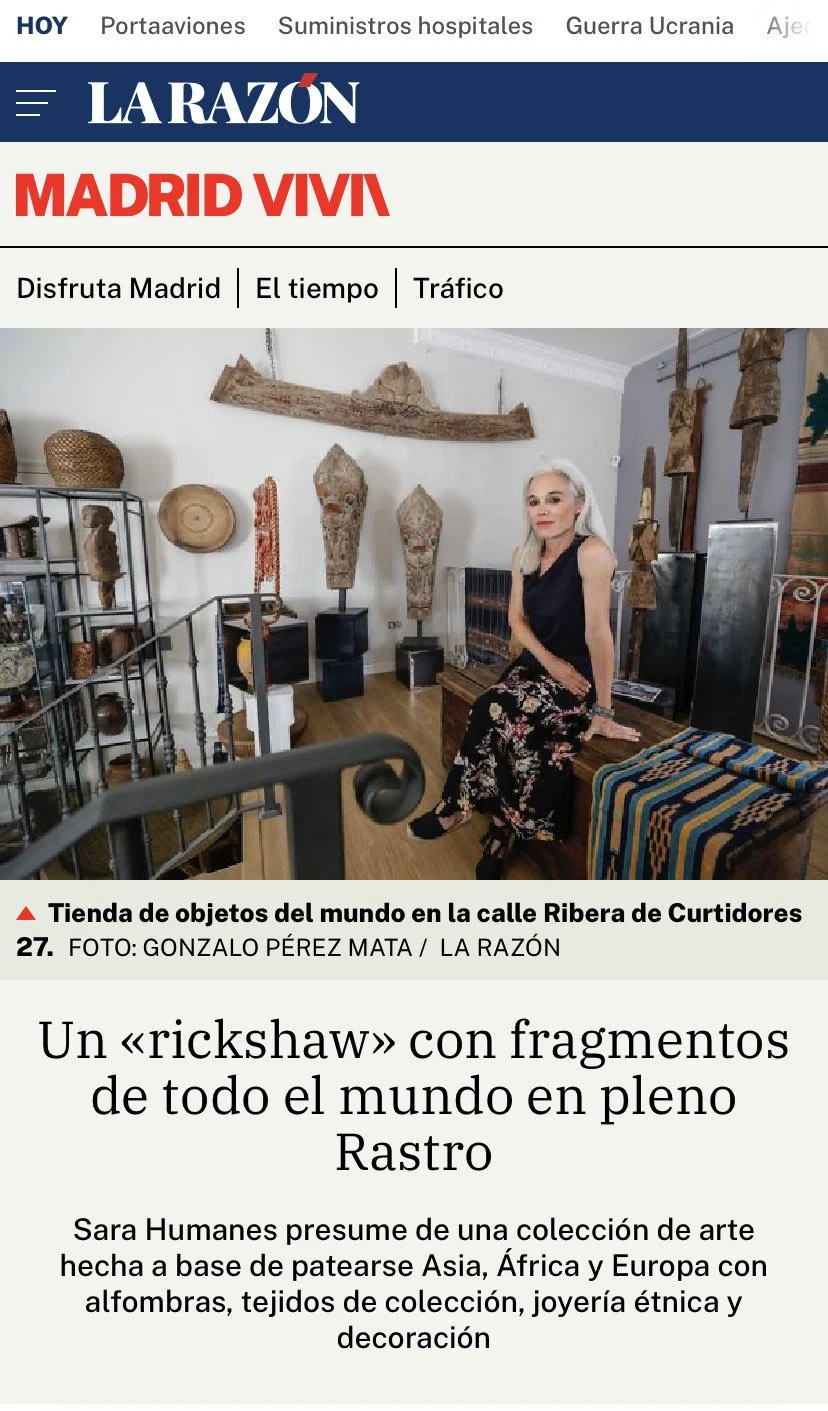 Un " rickshaw" con fragmentos del Mundo en pleno rastro