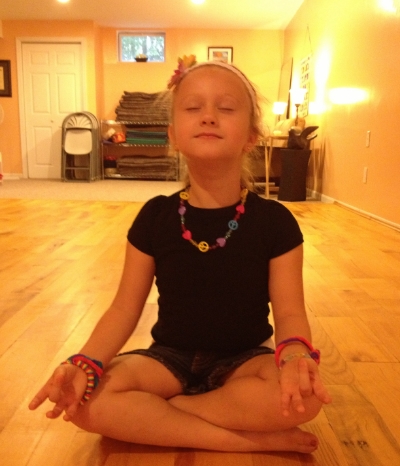 My daughter, Lexi, at 5 years old meditating.