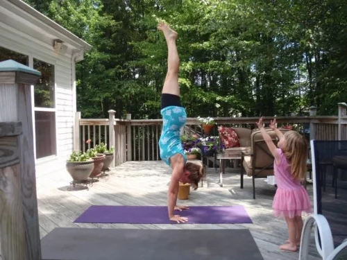 Lexi at 3 1/2 years old, uses her Jedi powers to keep Mommy balanced!