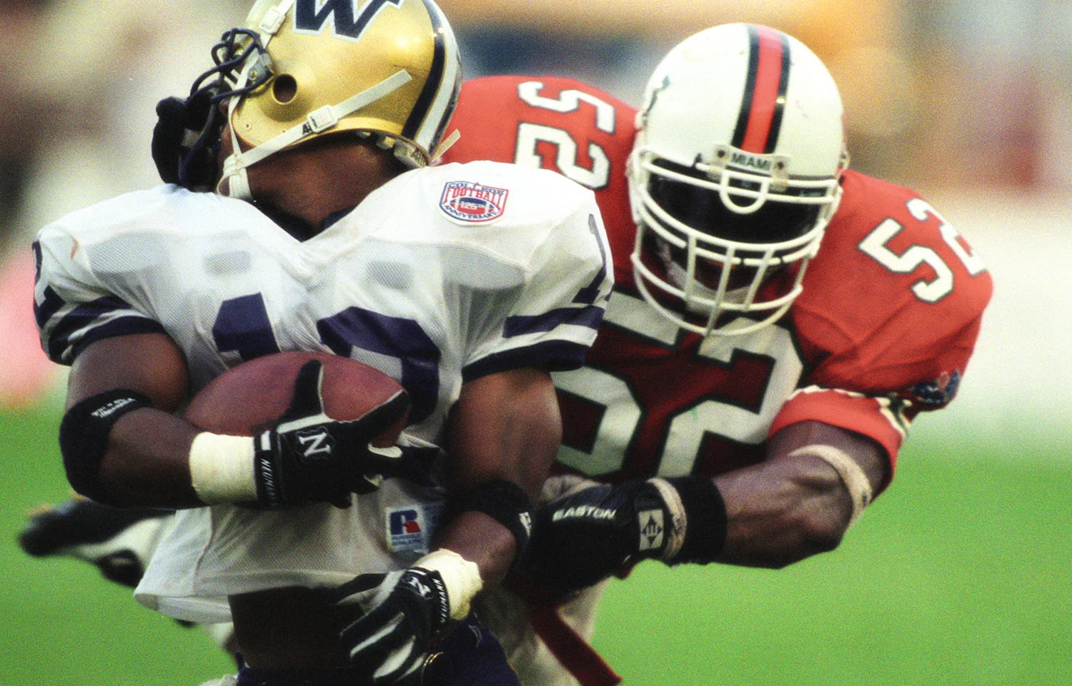tackle_washington_miami_football.jpg