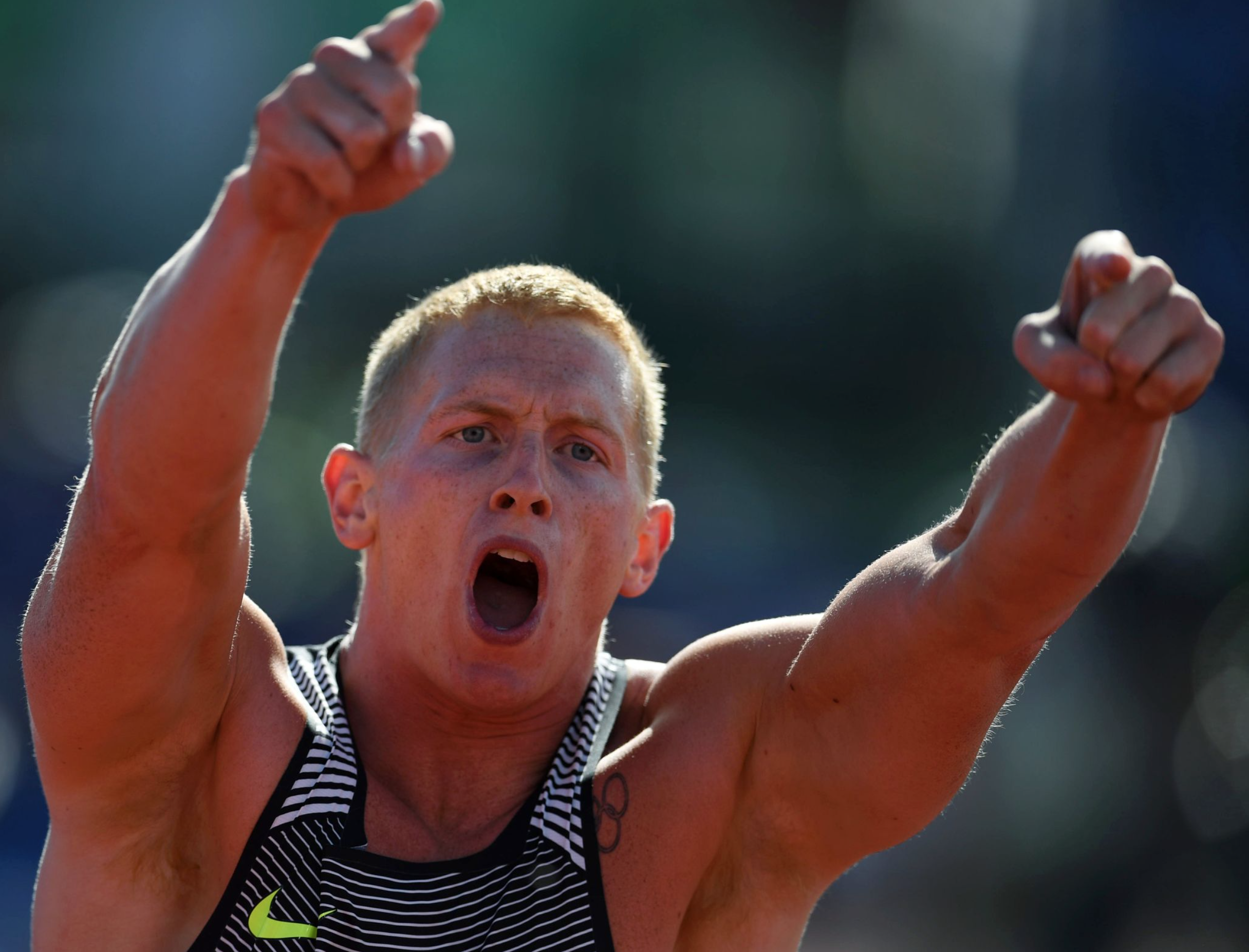 Cyrus Hostetler pointed to the crowd while competing in the men's javelin. His throw of 273 feet, 1 inch secured him first place, a trip to Rio and a meet record.