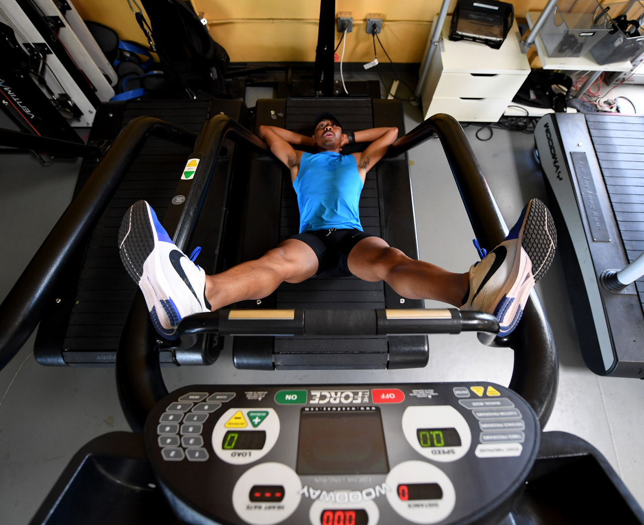 If anyone deserves a relaxing cooldown, it's Merritt, seen here stretching out on a treadmill at the EXOS facility in Scottsdale, Arizona. The Olympic athlete underwent a kidney transplant last September.