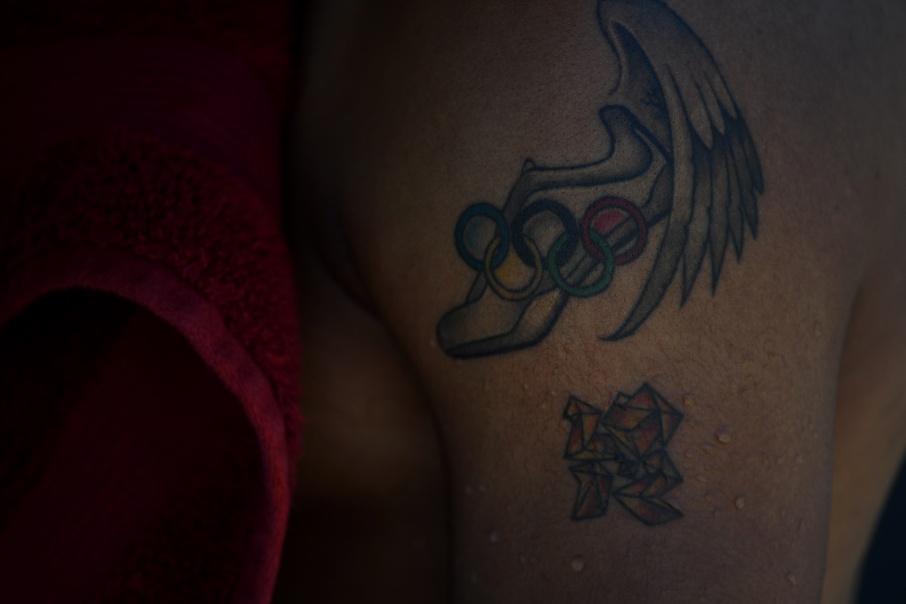 Merritt's tattoos pay tribute to his gold at the London Games in 2012 with a time of 12.92. A month later, he broke the world record in the 110 hurdles at 12.80, bettering the previous mark by seven-hundredths of a second. It was the largest drop in the record in 31 years.
