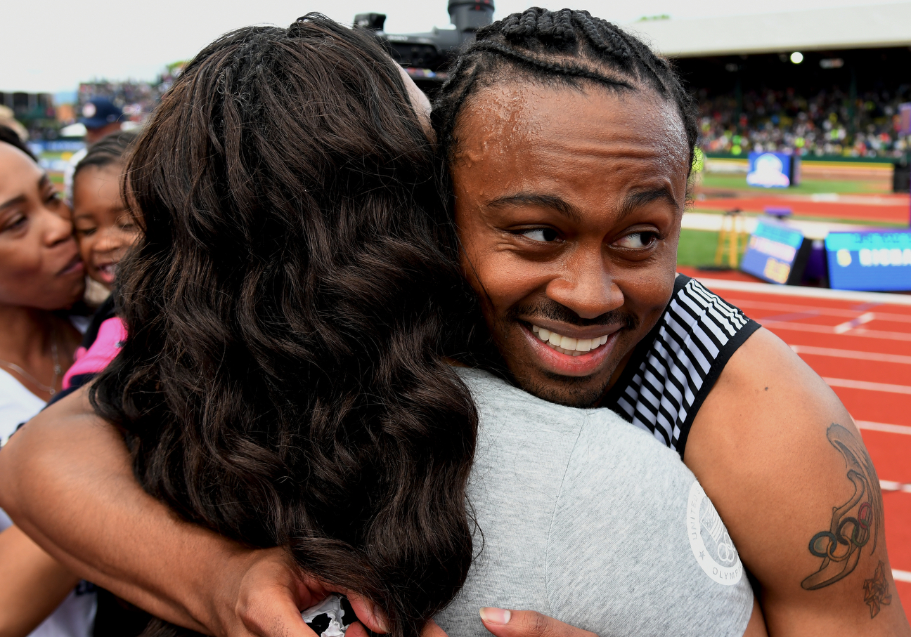 After advancing to the 110 final, Merritt hugs his mother, Linda Hubbard. She not only raised him, she helped nurse him back to health following his kidney transplant.