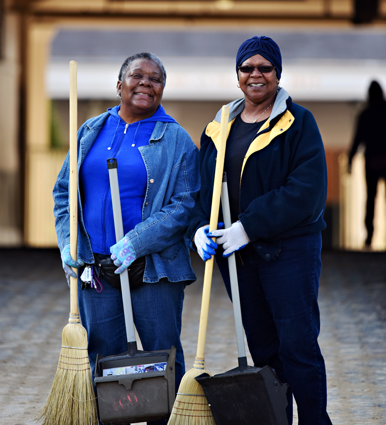Betty Bailey, left, and LaVerne Johnson have been sweeping at Churchill Downs for five years as part of a fundraiser for Cable Baptist Church. Bailey said "We're cleaning for Christ."