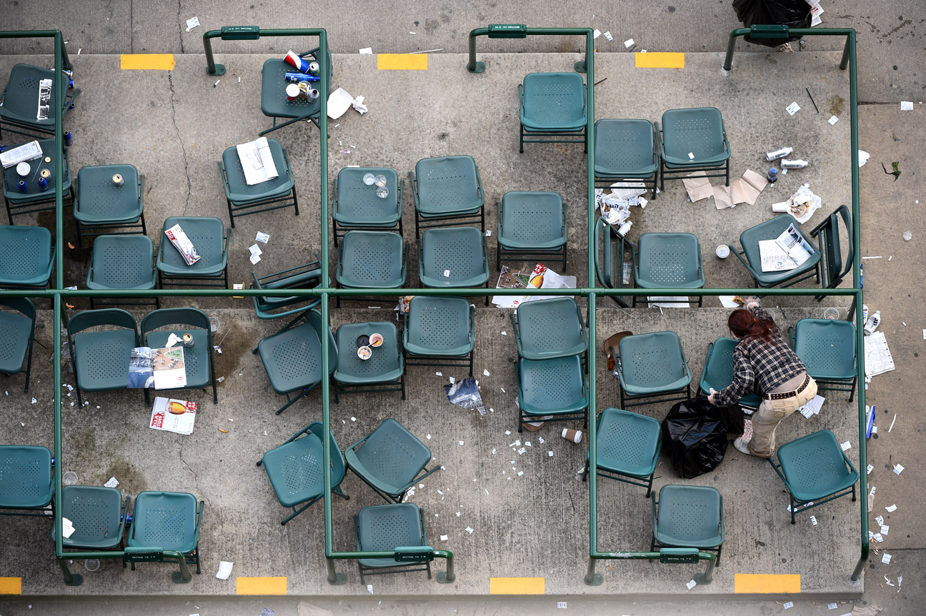 Workers clean up after a busy Thursday at Churchill Downs. Nearly 40,000 patrons watched as Silvertoni won the $100,000 Kentucky Juvenile, as part of the lead-up to Saturday's main event. The Thursday preceding the Oaks and Derby races has been referred to as "Thurby" in recent years.
