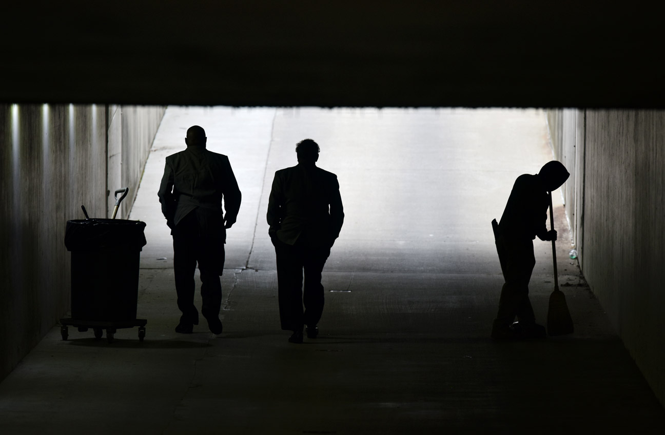 Jonathan Moore sweeps in a tunnel at Churchill Downs on Thursday. "I help with everything. I don't know what you'd call me," Moore says about his job. The 2015 Kentucky Derby attracted a record crowd of 170,513, and a similar-sized crowd this year figures to leave a veritable avalanche of refuse in its wake.