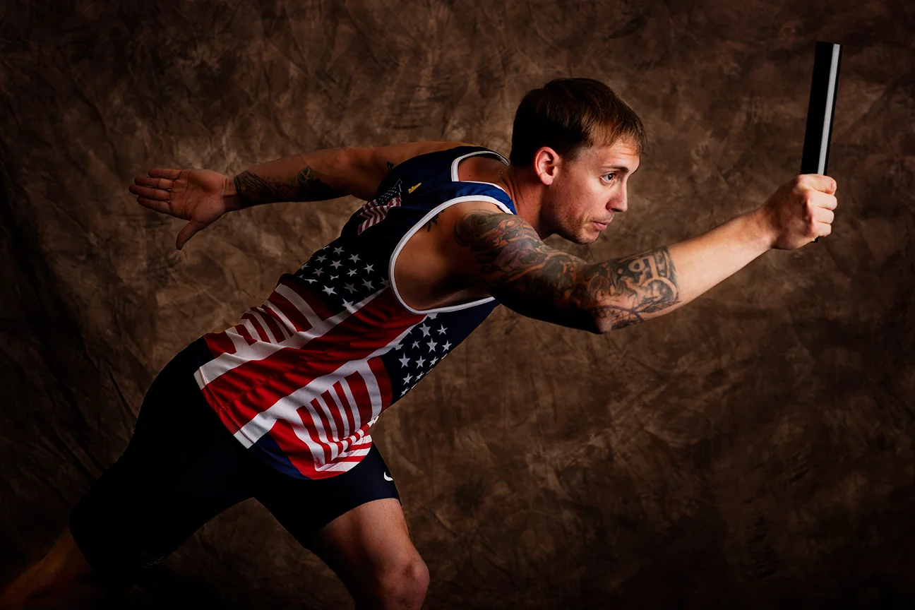 Sean Venezia, 27, is from Lafayette, Louisiana. He served in the Marine Corps and competed in track and cycling. Venezia ran the first leg for the gold medal-winning 4x100-meter relay team.