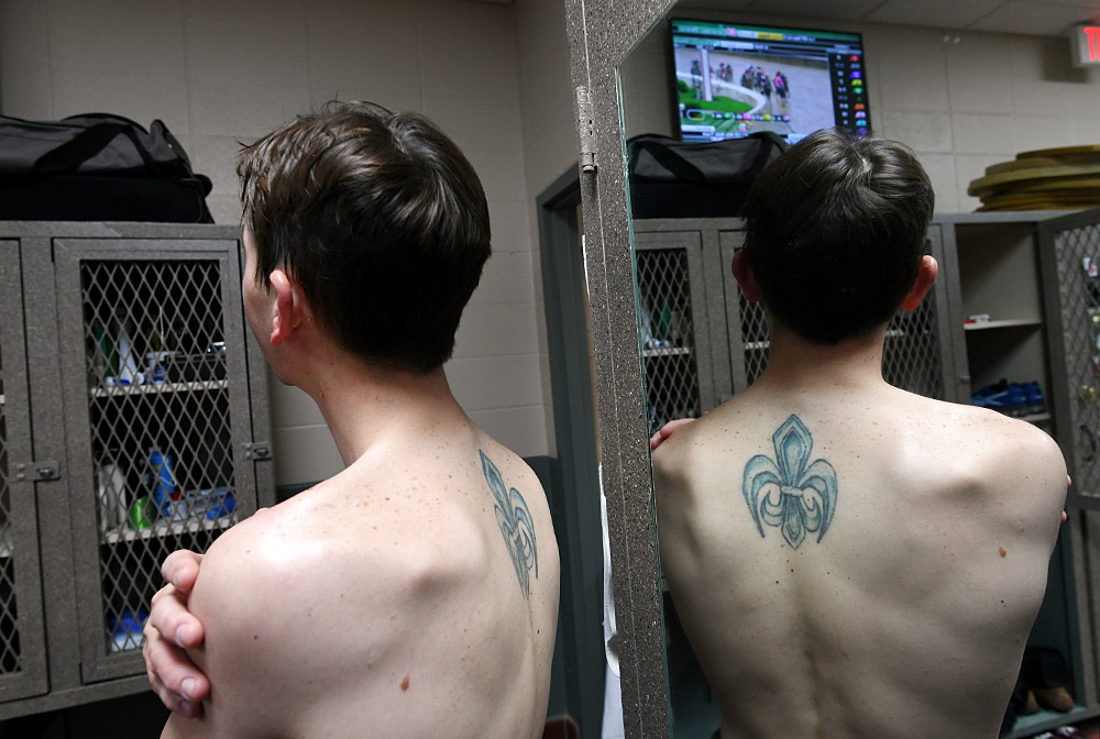 Hernandez watches a replay of the Kentucky Oaks race in the jockey room on Friday. Hernandez finished eighth in the race aboard Dream Dance in 2016.
