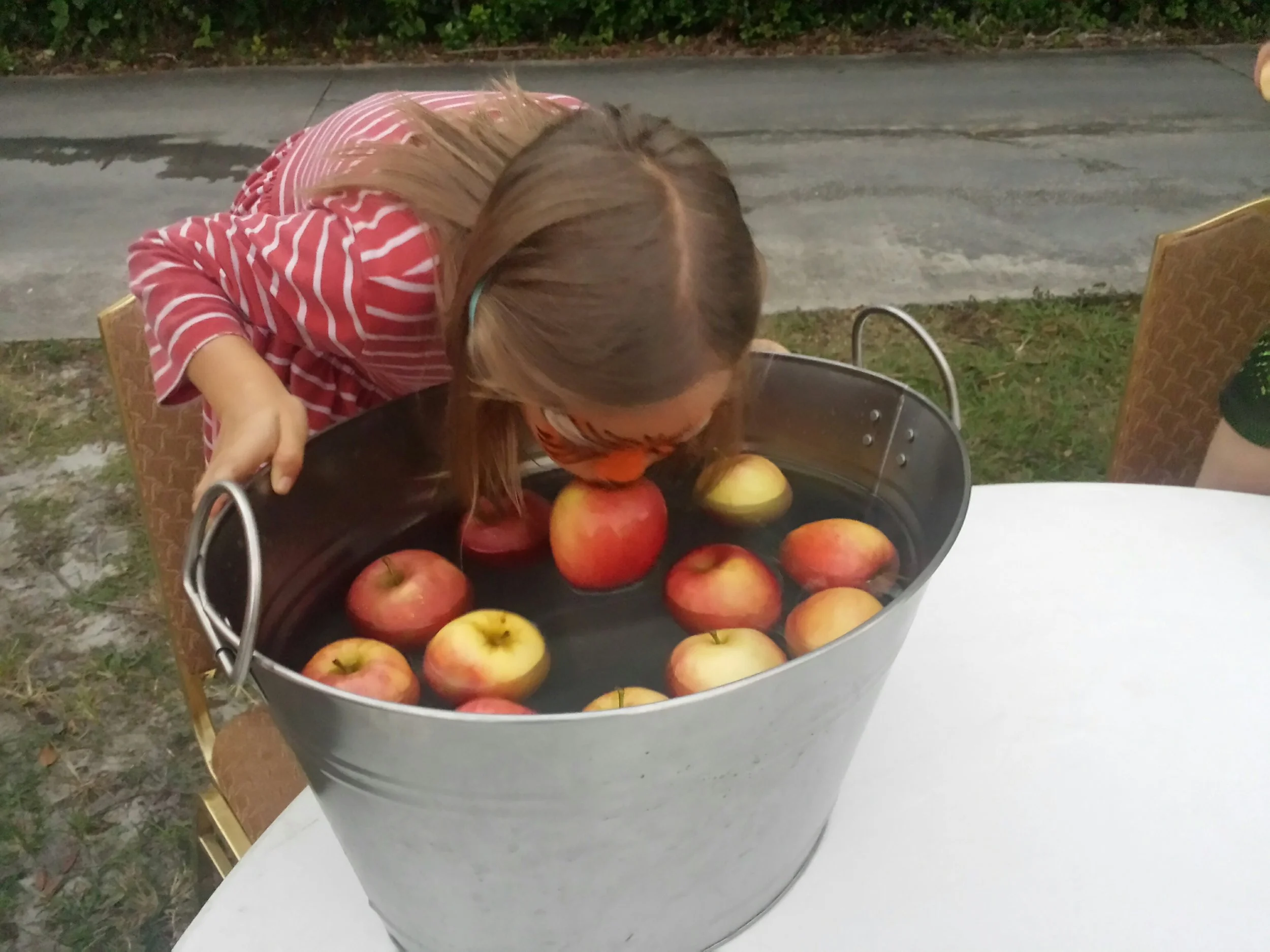 An evening of warmth, laughter, and challenging activities, such as apple bobbing, cookie decorating, pie eating, and cake walking. Not to mention the delicious food from the evening's chili cookoff!