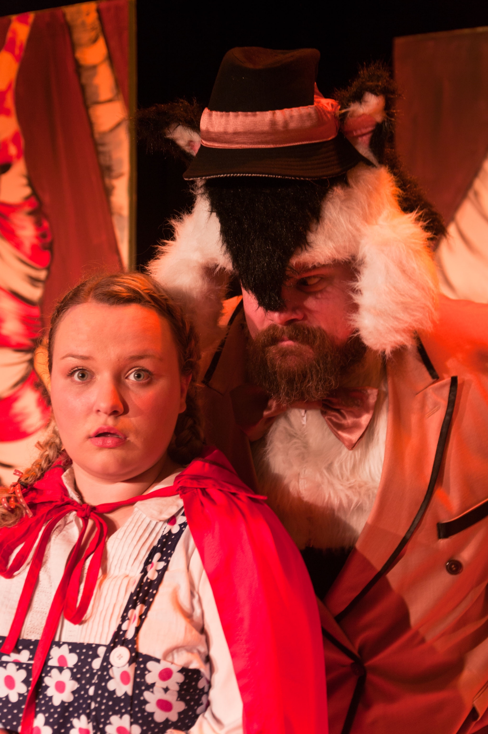Little Red Riding Hood ; Valerie Hosler as Red Riding Hood and Jesse Davis as the Wolf/Huntsman. Photo by Mark Ambramowitz. Photo courtesy of SummerFest.