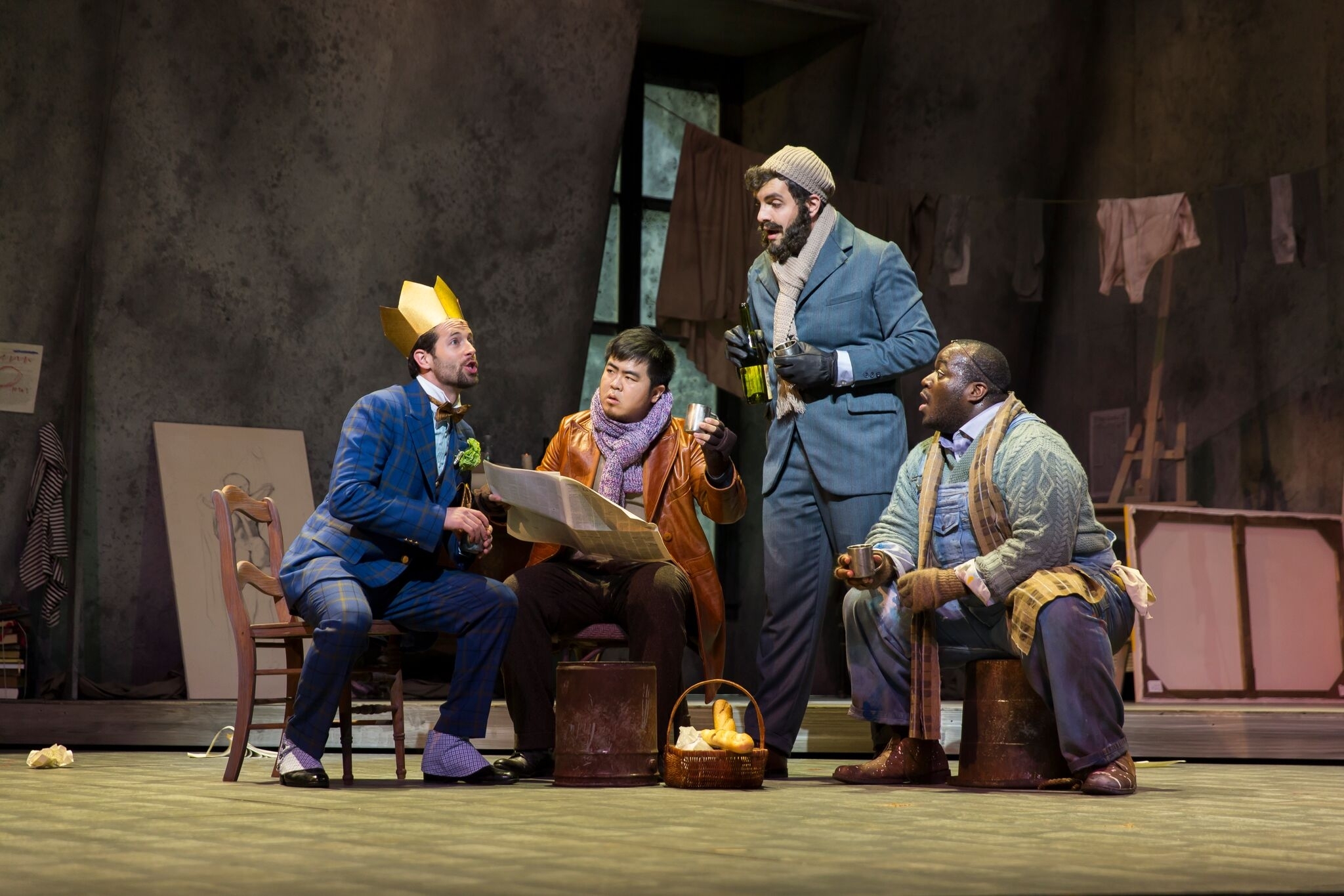 Shea Owens as Schaunard; Yongshao Yu as Rodolfo; Timothy Bruno as Colline; Reginald Smith, Jr. as Marcello; photo by Scott Suchman; courtesy of Wolf Trap Opera 2016.