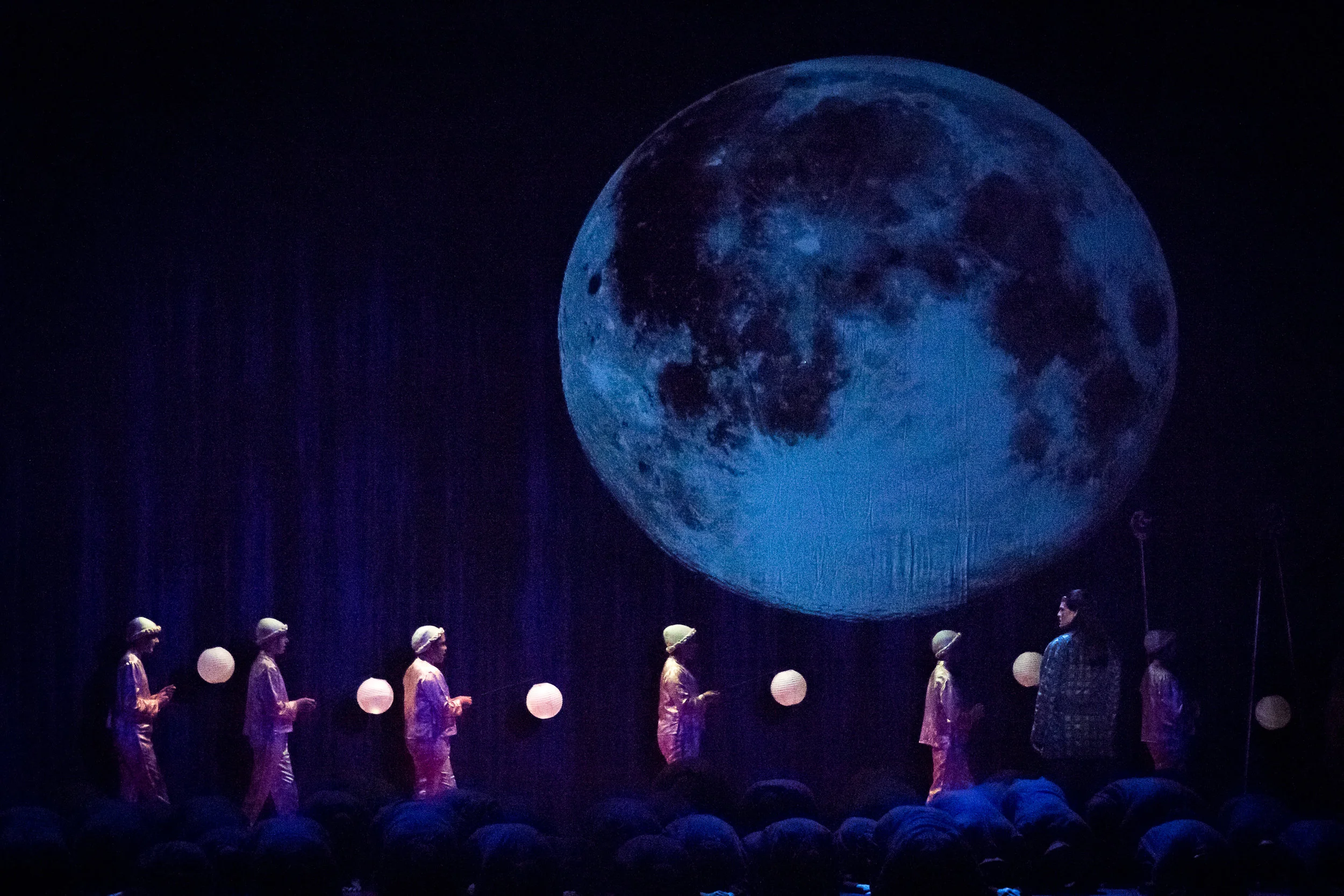 Night has fallen and the city is lit so that everyone can stay awake to discover the answer to Prince Calaf's challenge to Turandot. Photo by Ben Schill Photography; courtesy of Virginia Opera.