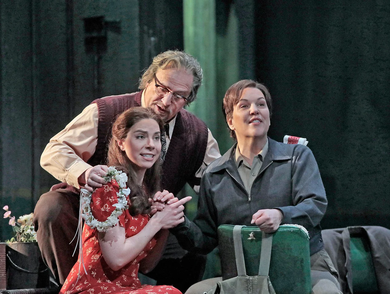 Hanna-Elizabeth Muller as Marzelline, Falk Struckmann as Rocco, and Adrianne Pieczonka as Leonore . Photo by Ken Howard; courtesy of the Metropolitan Opera.