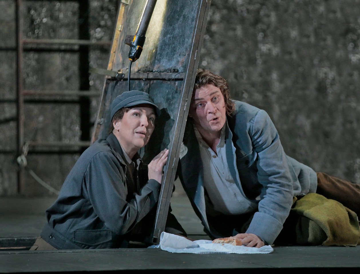 Adrianne Pieczonka as Leonore and Klaus Florian Vogt as Florestan . Photo by Ken Howard; courtesy of the Metropolitan Opera.