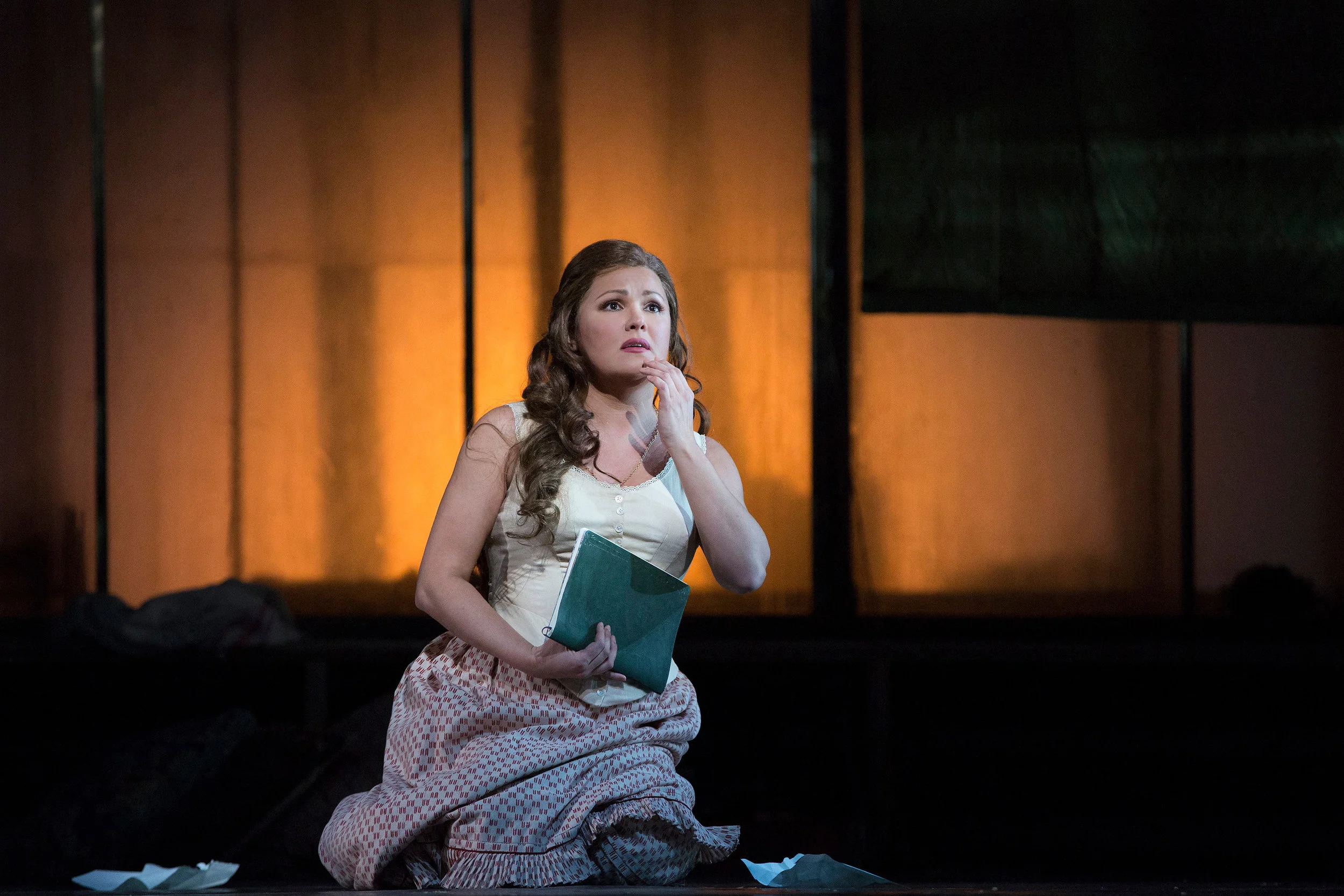 Anna Netrebko as a young Tatiana . Photo by Marty Sohl; courtesy of the Metropolitan Opera.