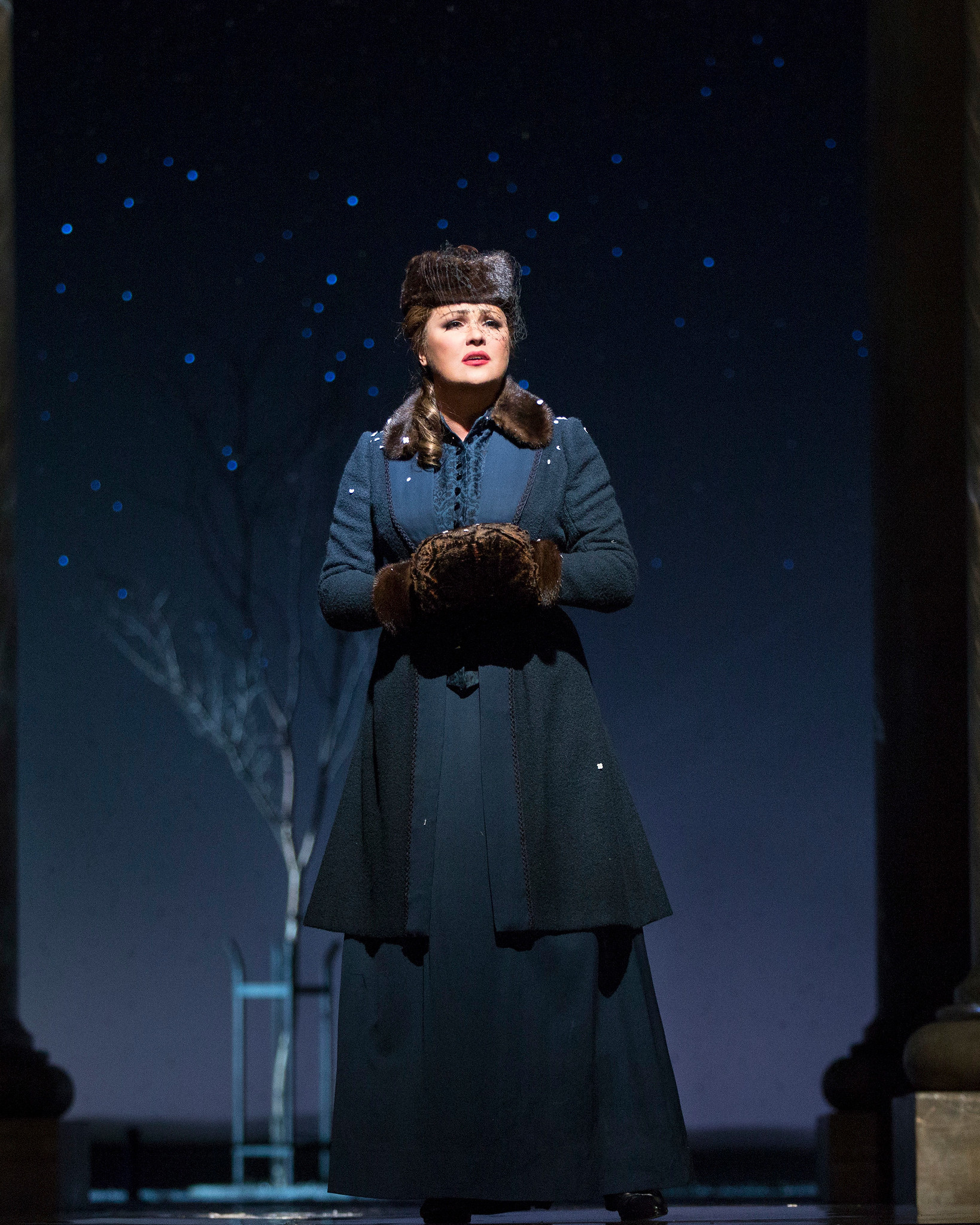 Anna Netrebko as a more mature Tatiana . Photo by Marty Sohl; courtesy of the Metropolitan Opera