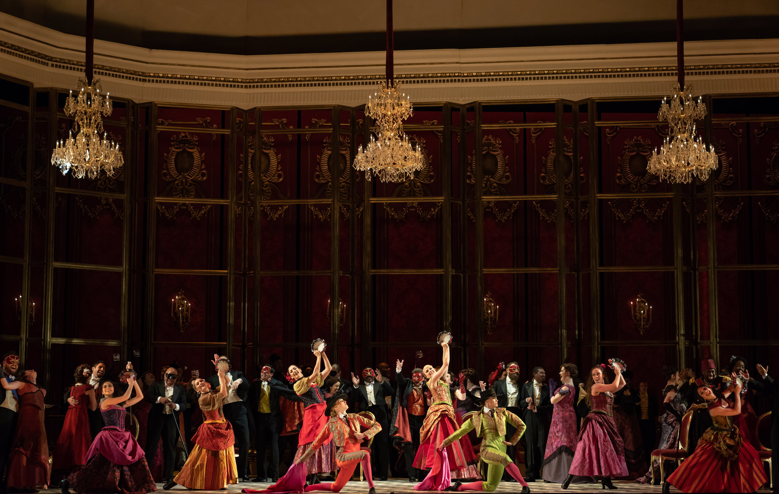 Dancers and matadors enliven the party during WNO's La traviata 2018 production_credit Scott Suchman.jpg