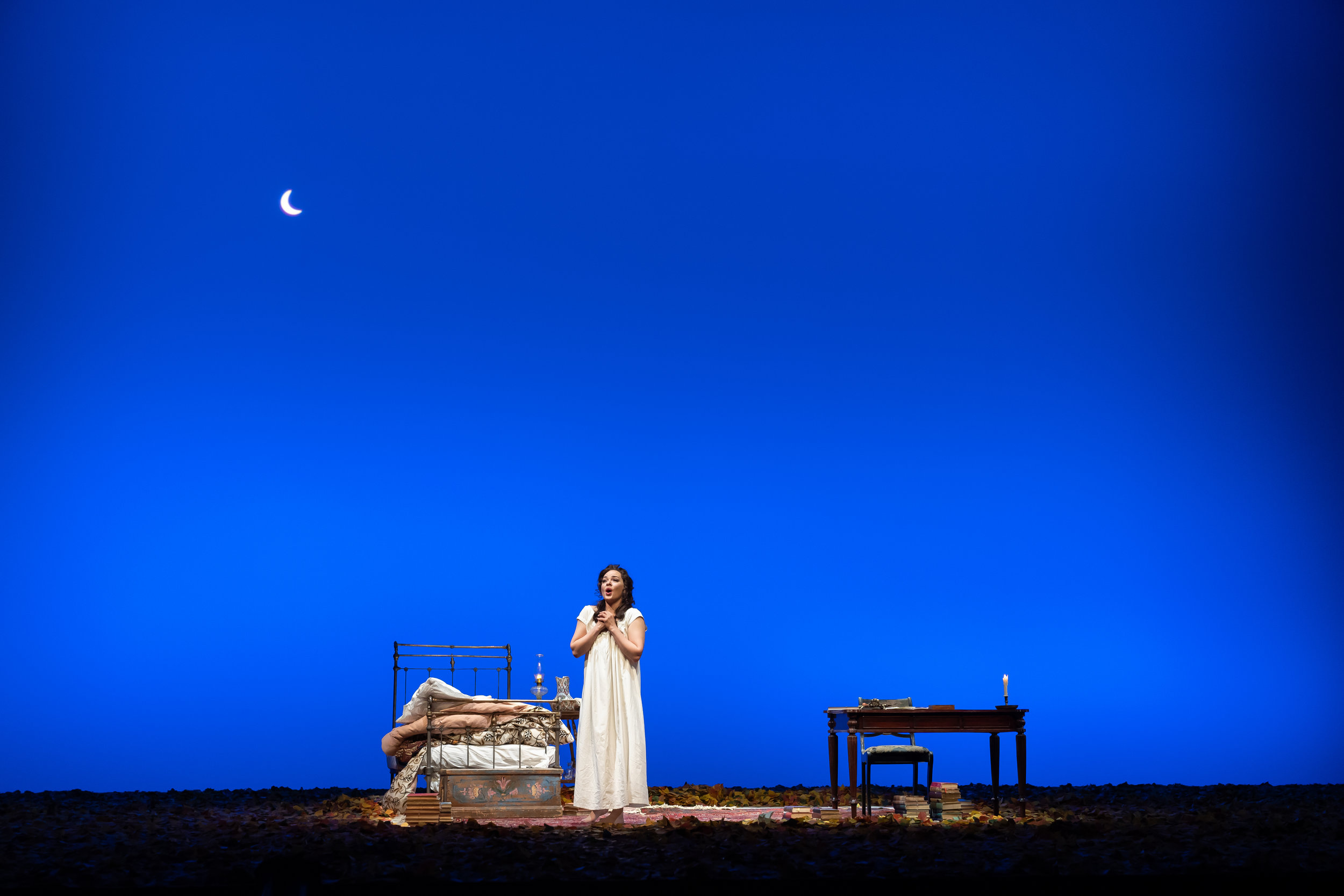 Too excited to sleep, Tatiana (soprano Anna Nechaeva) sings of love in WNO's production of Eugene Onegin_credit Scott Suchman  - Copy.JPG