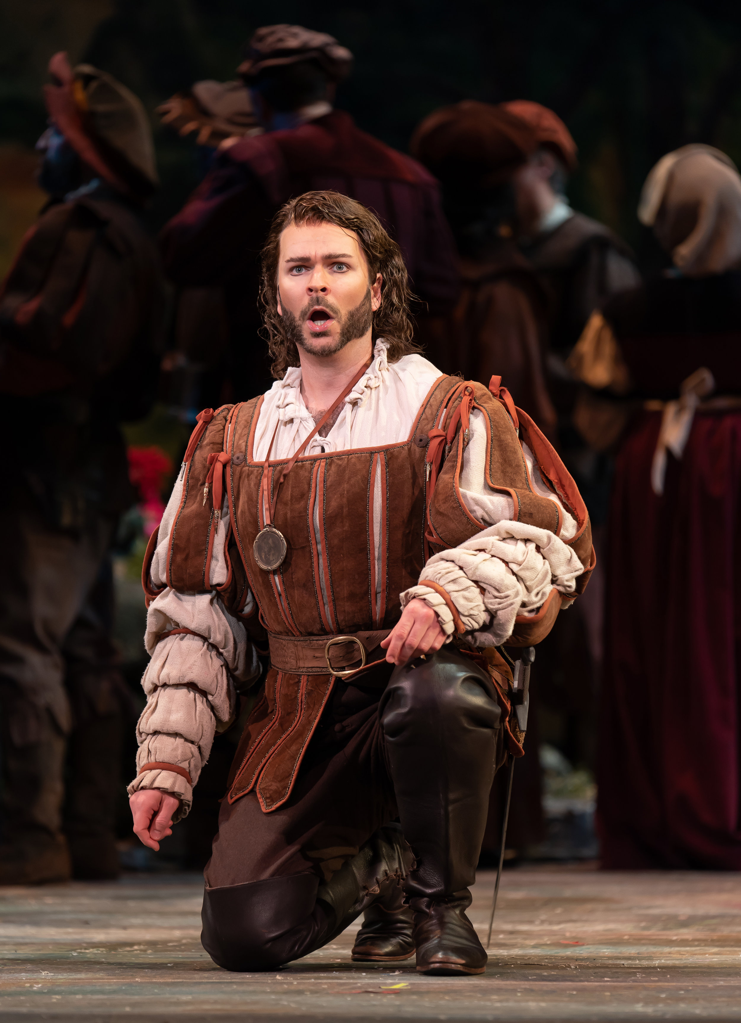 Valetin (baritone Joshua Hopkins), a young soldier, prepares for war and hopes God will protect his sister during his absence in WNO's production of Faust_credit Scott Suchman .jpg